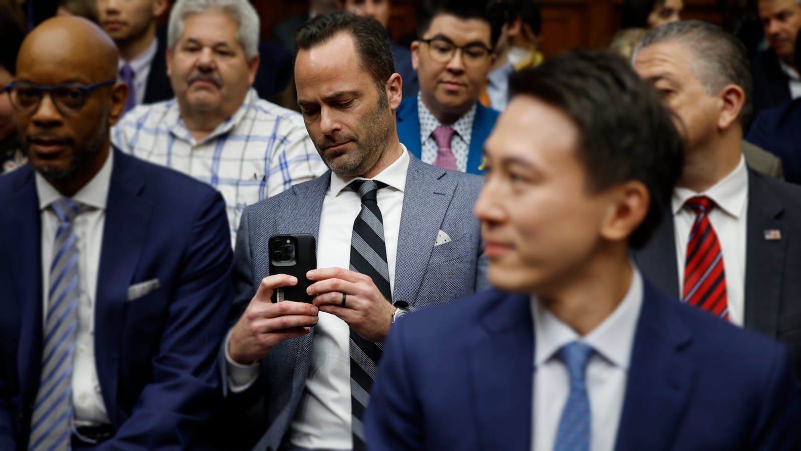 TikTok vice president Michael Beckerman photographs CEO Shou Zi Chew before he testifies to Congress on March 23. Photo by Getty.
