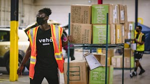 Workers at a Veho facility in Atlanta in 2021. Photo by Bloomberg.