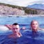 Emad Mostaque, Vitalik Buterin and Grimes in the waters of Montenegro. Photo-illustration by Clark Miller.
