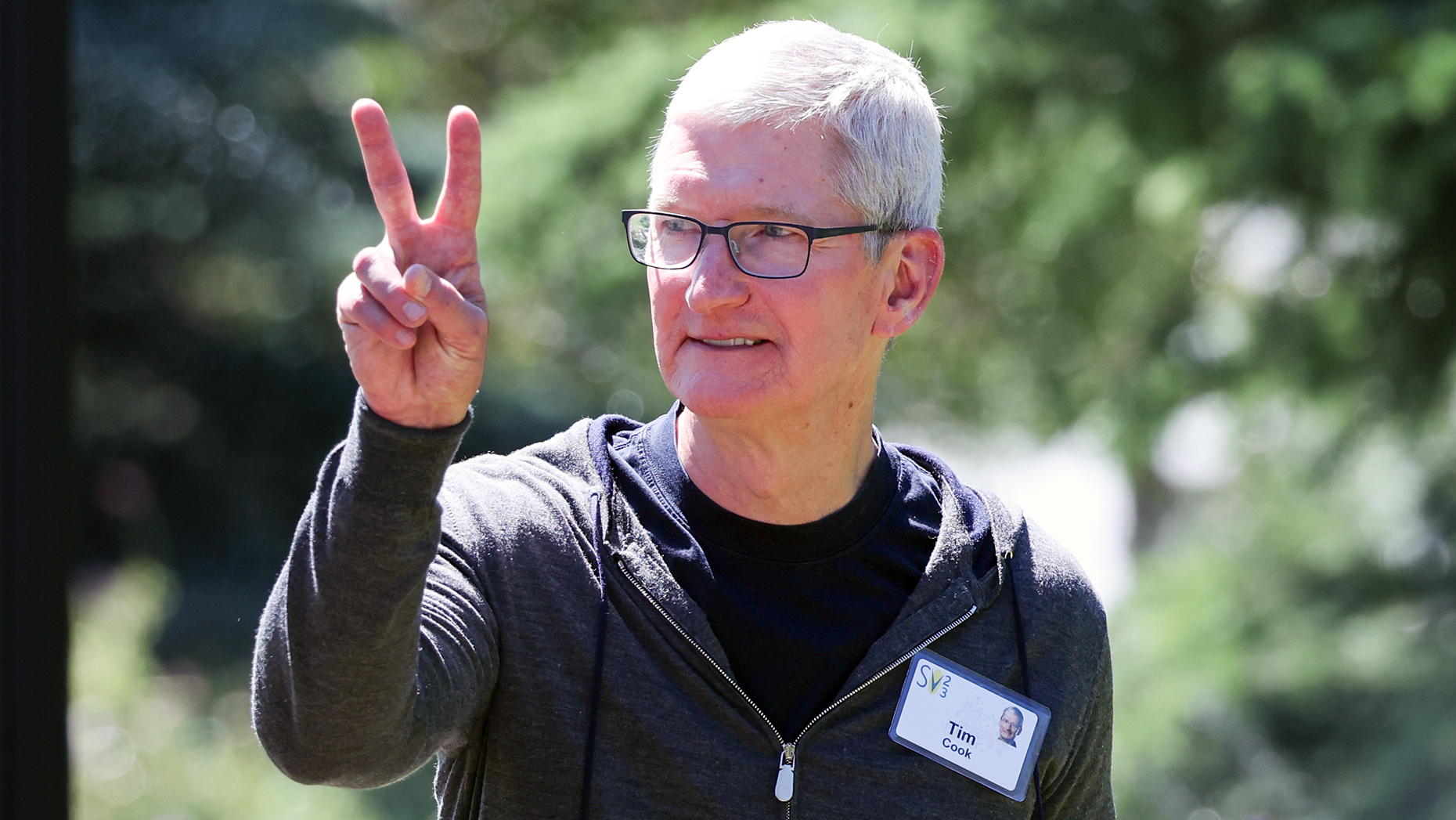 Tim Cook peacing out. Photo by Getty.