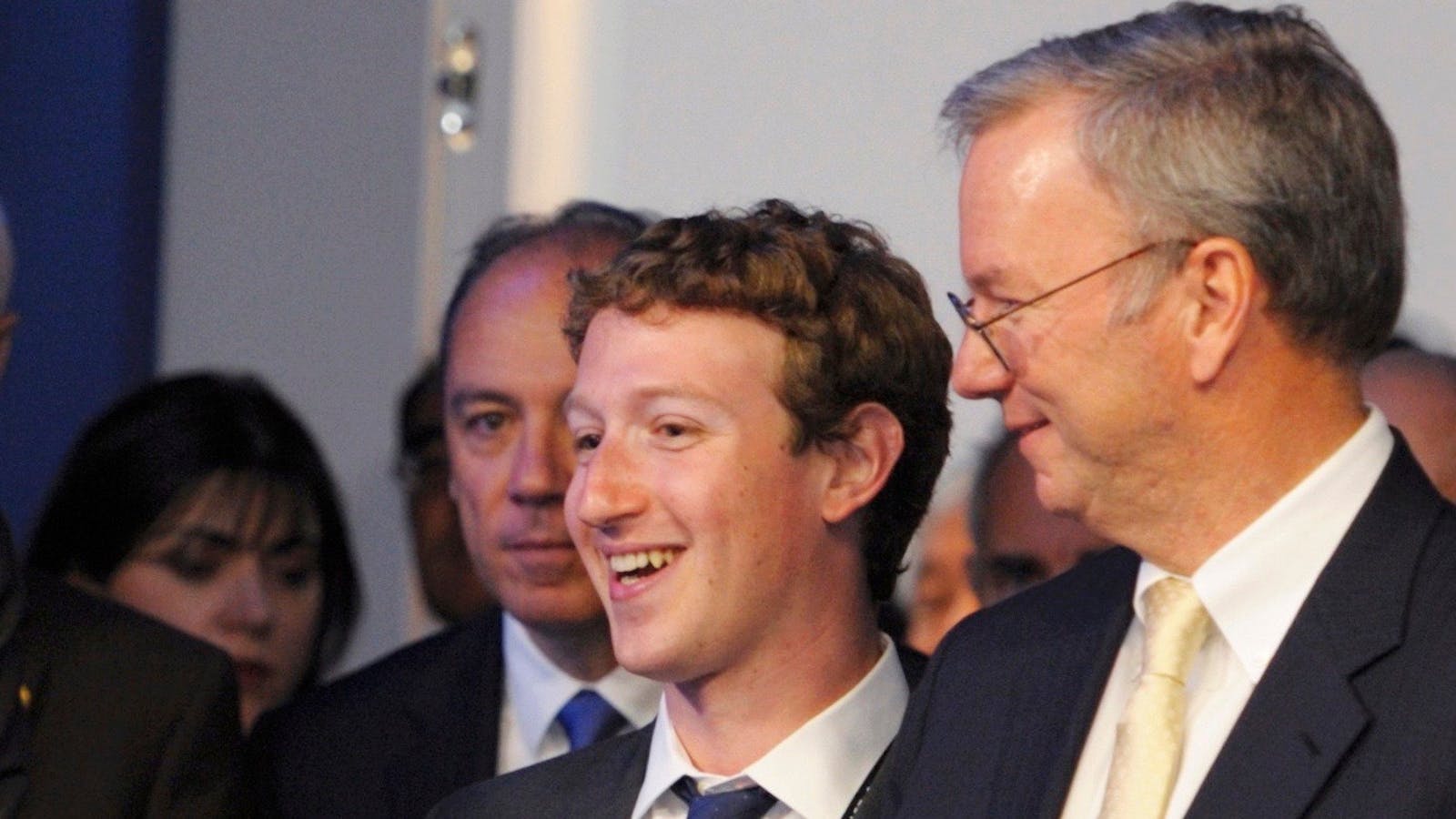 Mark Zuckerberg, center, with Google's Eric Schmidt in 2011. Photo by AP.