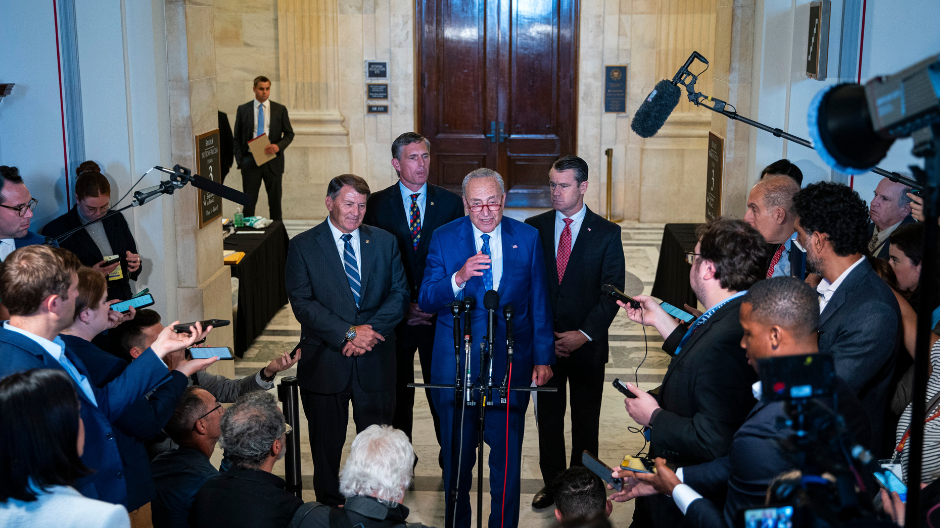 Senate Majority Leader Chuck Schumer speaks during a news conference following a Senate bipartisan Artificial Intelligence Insight Forum. Photo by Bloomberg via Getty.