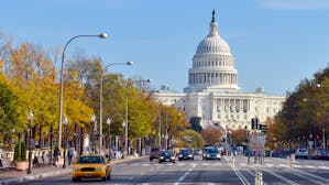 The U.S. Capitol building from Pennsylvania Avenue. Photo via Shutterstock.