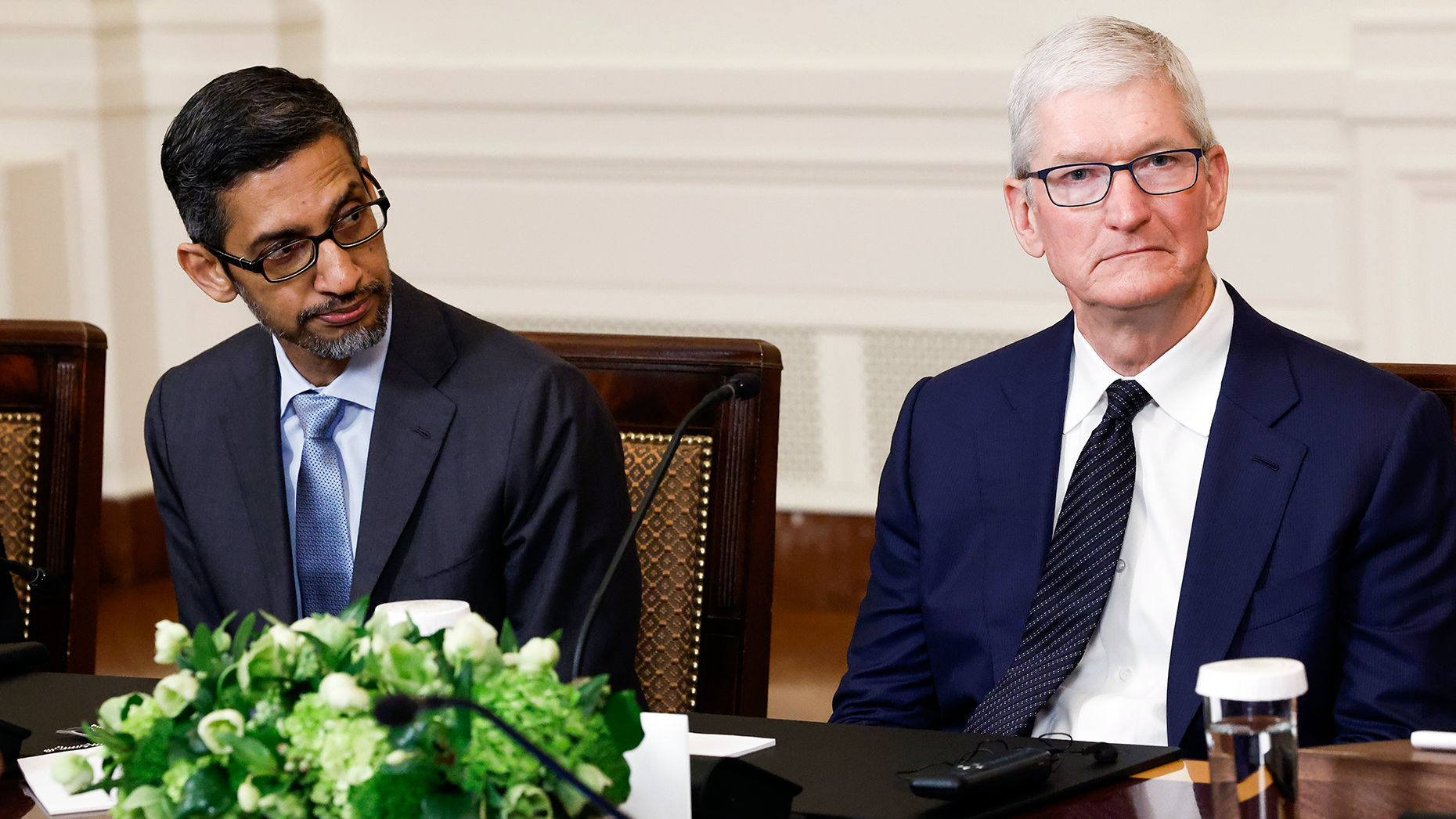 Google CEO Sundar Pichai and Apple CEO Tim Cook. Photo by Getty.