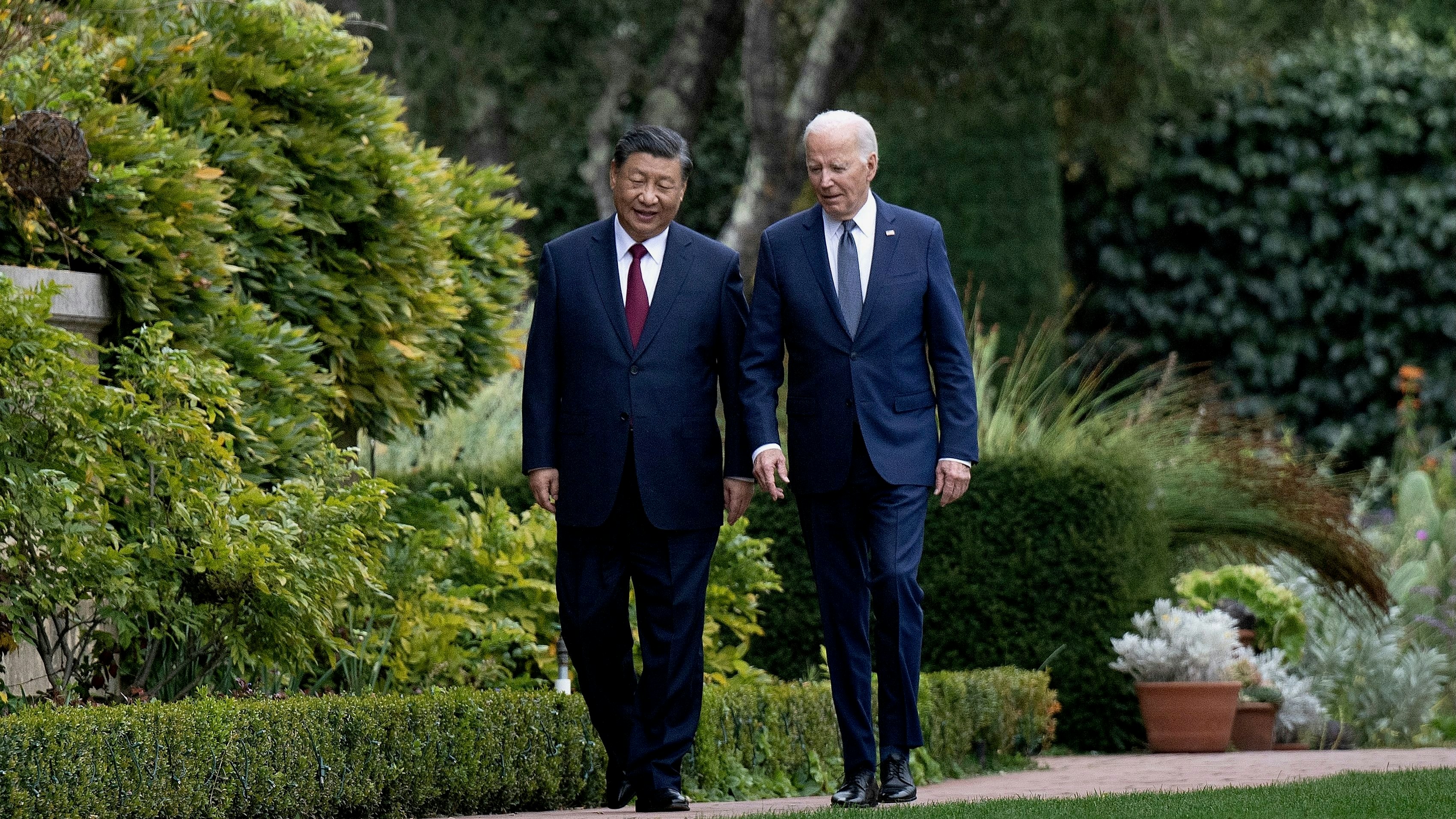 Chinese President Xi Jinping (left) and US President Joe Biden in Woodside, Calif., on Wednesday. Photo AFP via Getty