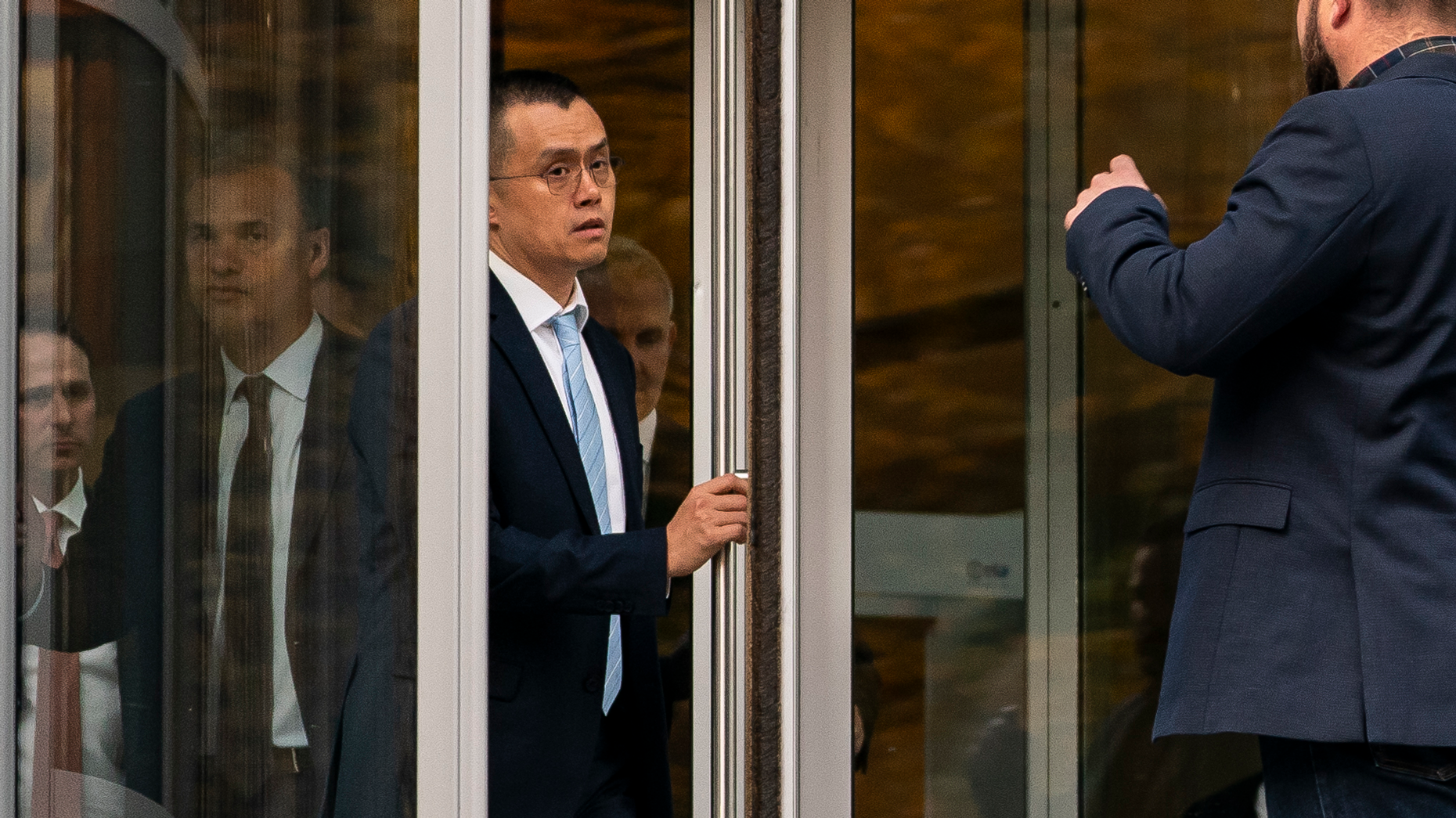 Binance CEO Changpeng Zhao leaves the U.S. District Court on Nov. 21 in Seattle. Photo by David Ryder/Getty.