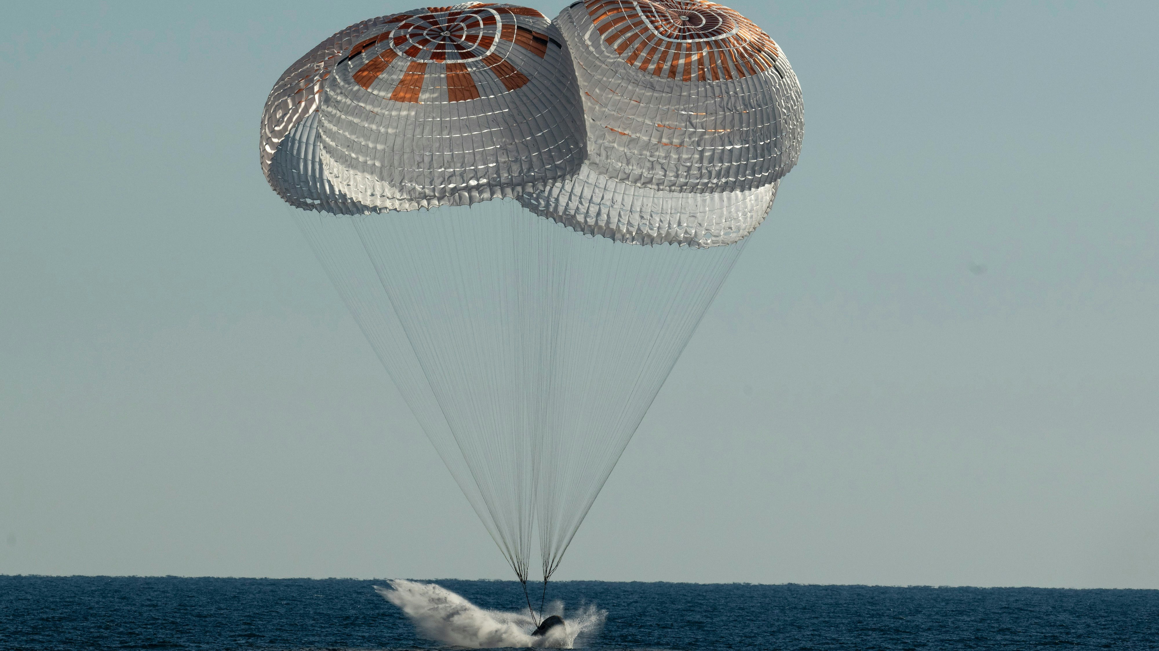 A NASA crew lands in the Atlantic Ocean aboard a SpaceX spacecraft in Oct. 2022. Bill Ingalls/NASA via Getty Images