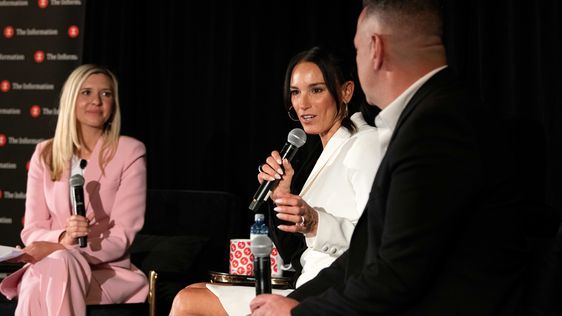 Heidi and Marc D'Amelio speak at The Information's Creator Economy Summit in April 2023. Photo by Erin Beach