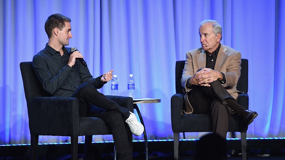 Snapchat CEO Evan Spiegel speaks to journalist Ken Auletta. Photo by Larry Busacca/Getty Image.
