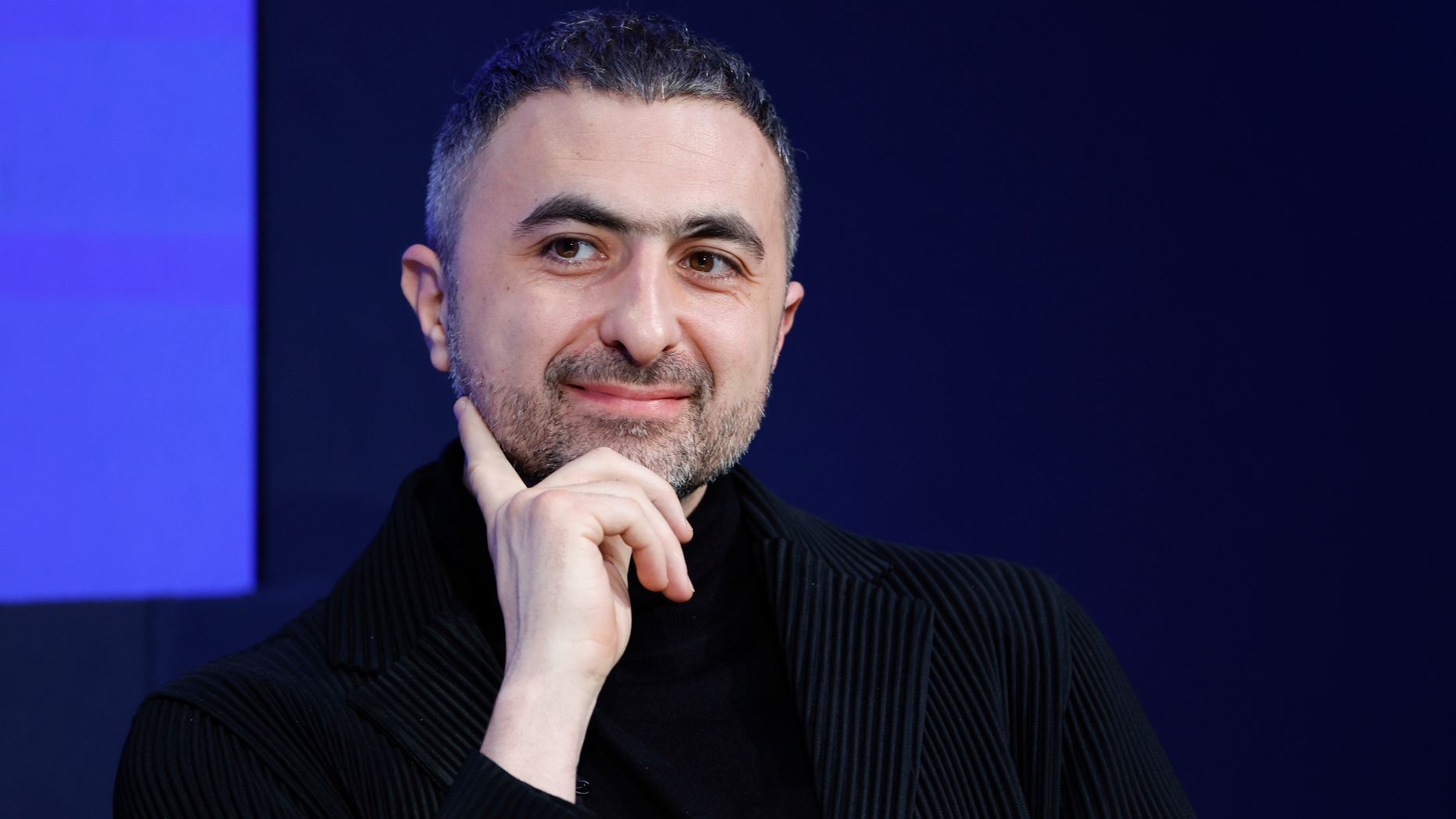 Mustafa Suleyman at the World Economic Forum in January. Photographer by Stefan Wermuth/Bloomberg via Getty Images.