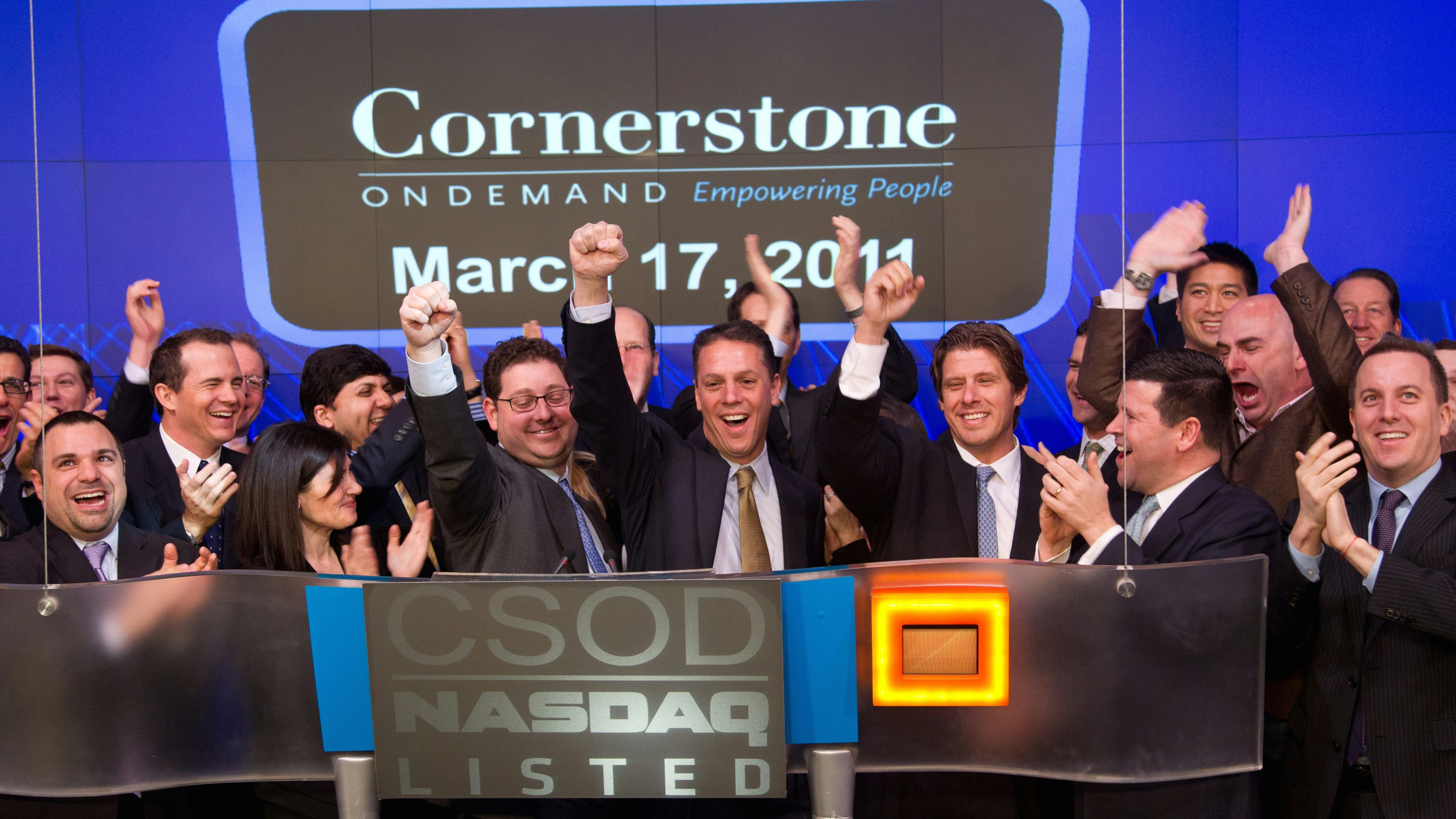 Cornerstone executives, including CEO Adam Miller in the center, on the day the company listed on Nasdaq. Photo by Nasdaq.