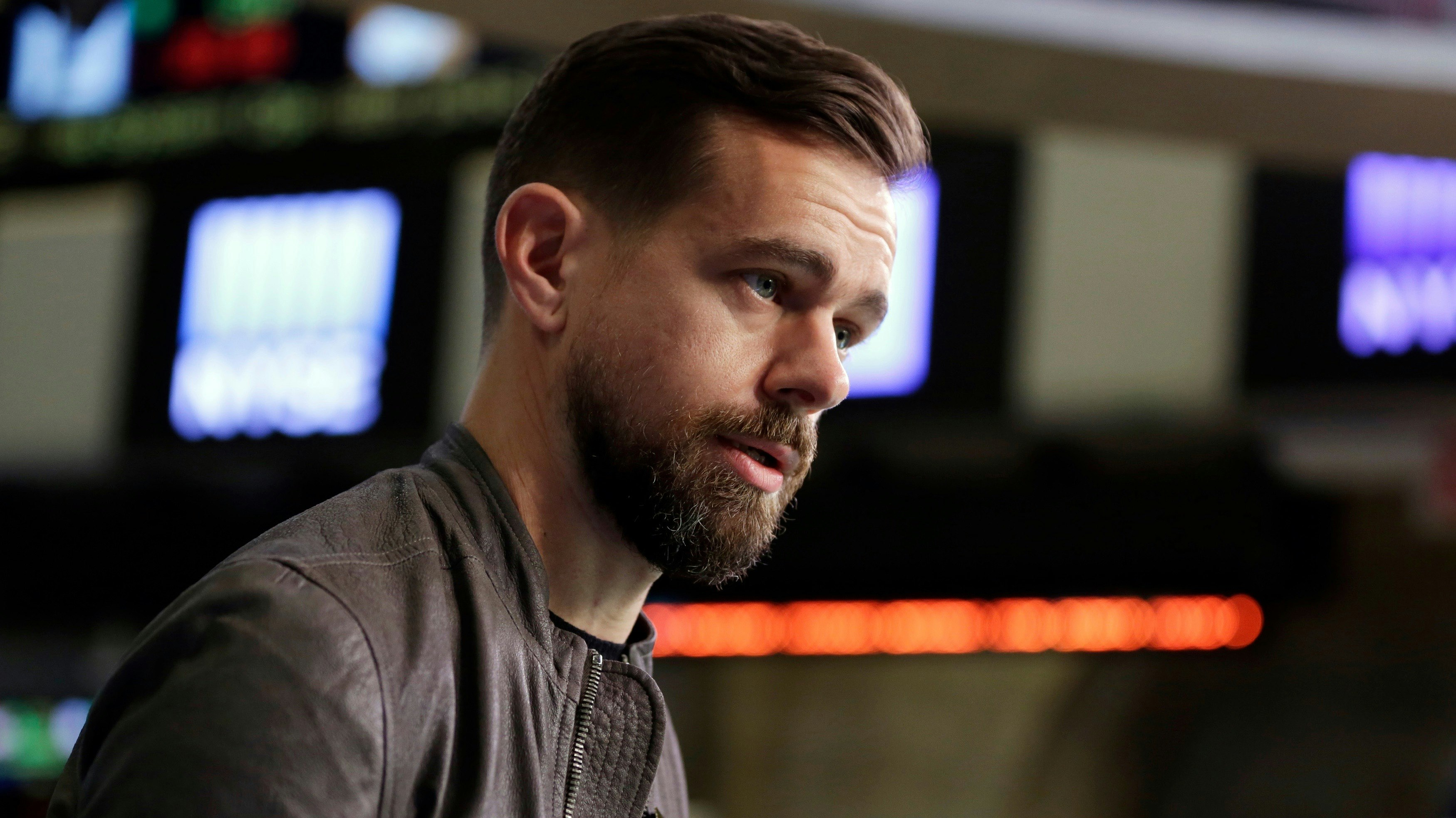 Twitter CEO Jack Dorsey. Photo by AP. Screen shot of Huffington Post's Twitter profile page.