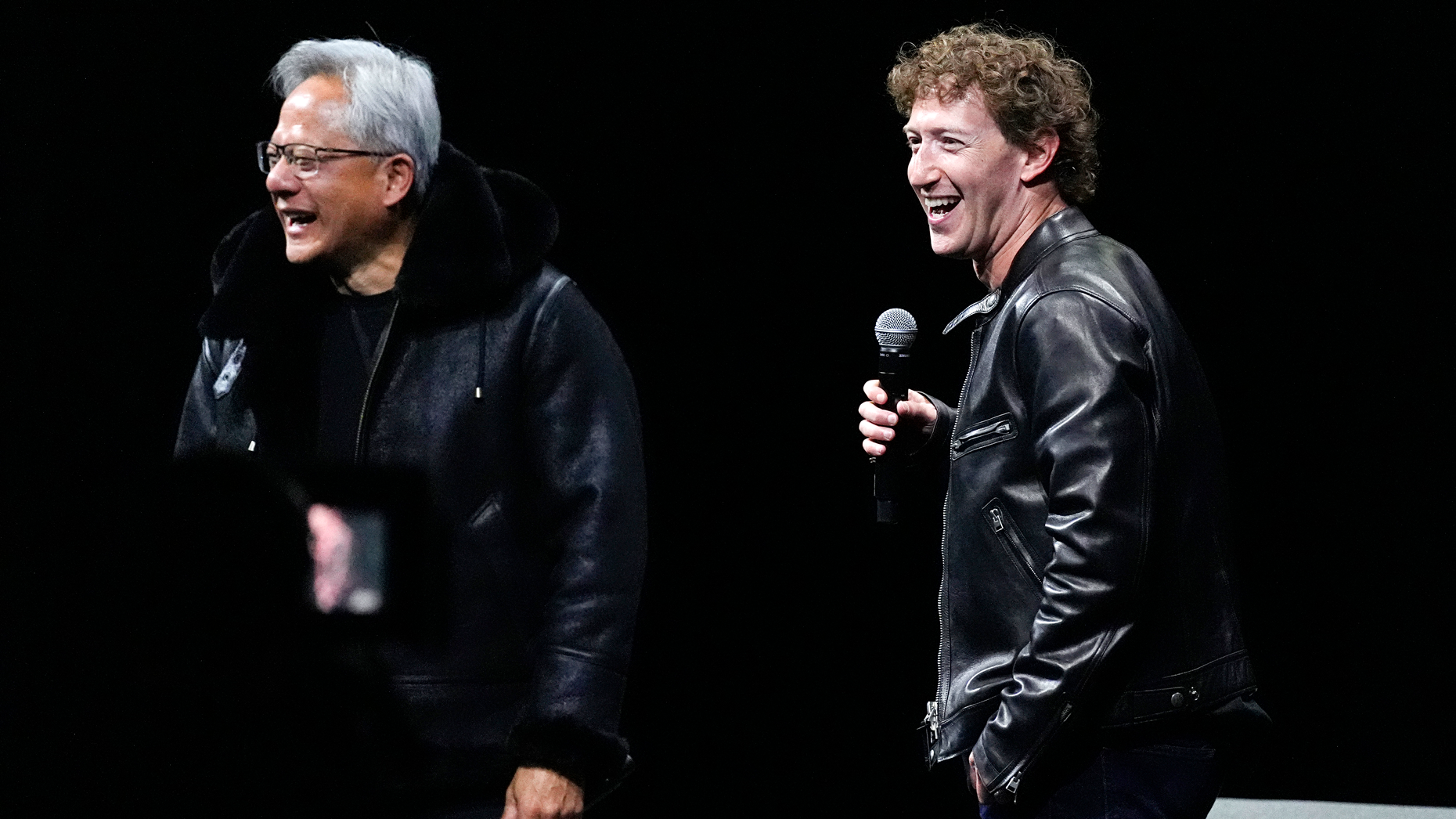 Nvidia's Jensen Huang and Meta's Mark Zuckerberg at a conference on computer graphics earlier this year. Photo by AP/David Zalubowski.