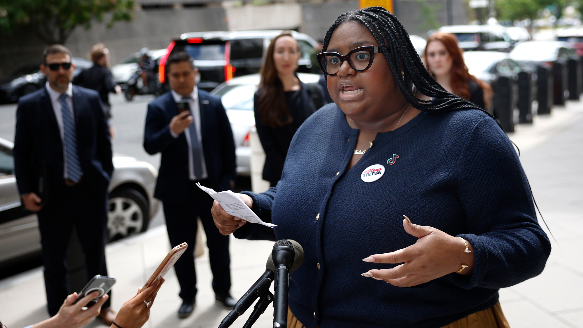 TikTok creator Talia Cadet speaks to reporters outside the courthouse in Washington on Monday. Photo by Kevin Dietsch/Getty Images.