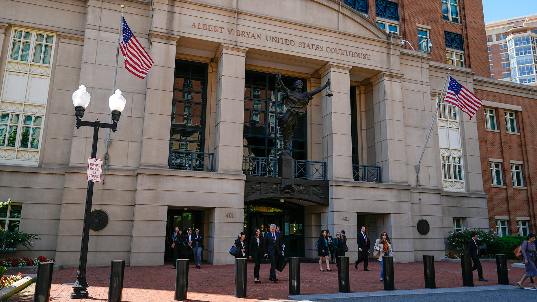 Lawyers leave the U.S. District Court for the Eastern District of Virginia on Sept. 9 where the Department of Justice's antitrust trial against Google is being held. Photo by AP