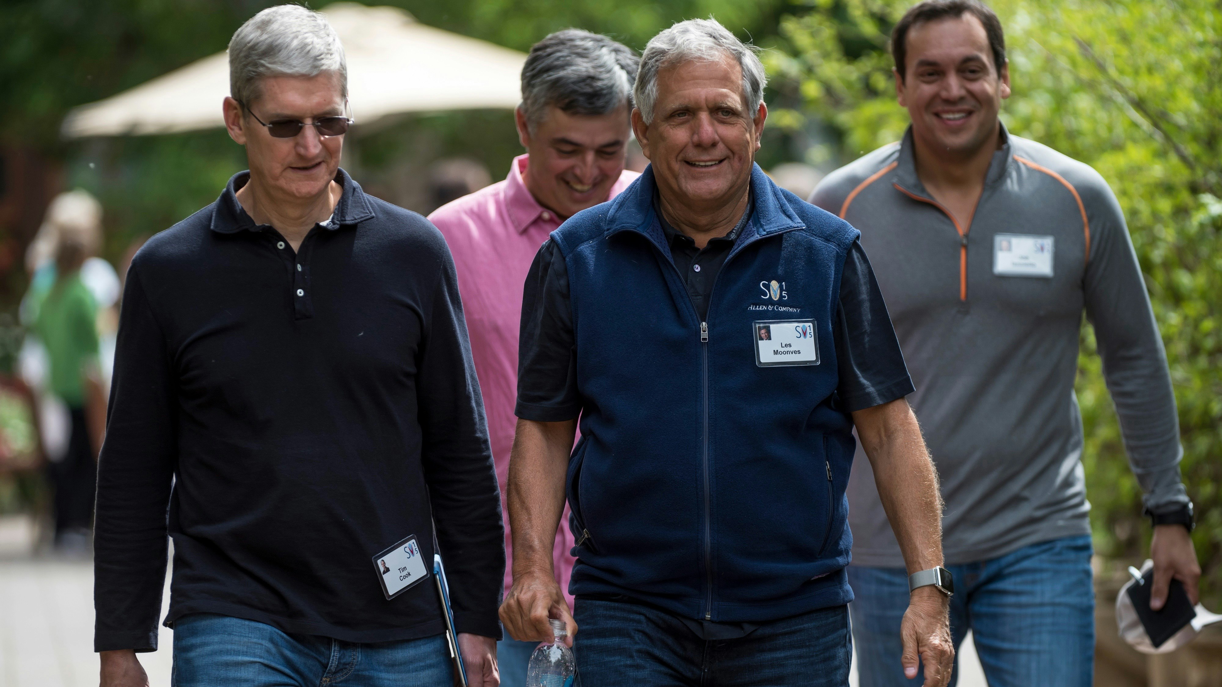 Tim Cook, left, Eddy Cue, Les Moonves and Joe Ianniello of CBS. Photo by Bloomberg.
