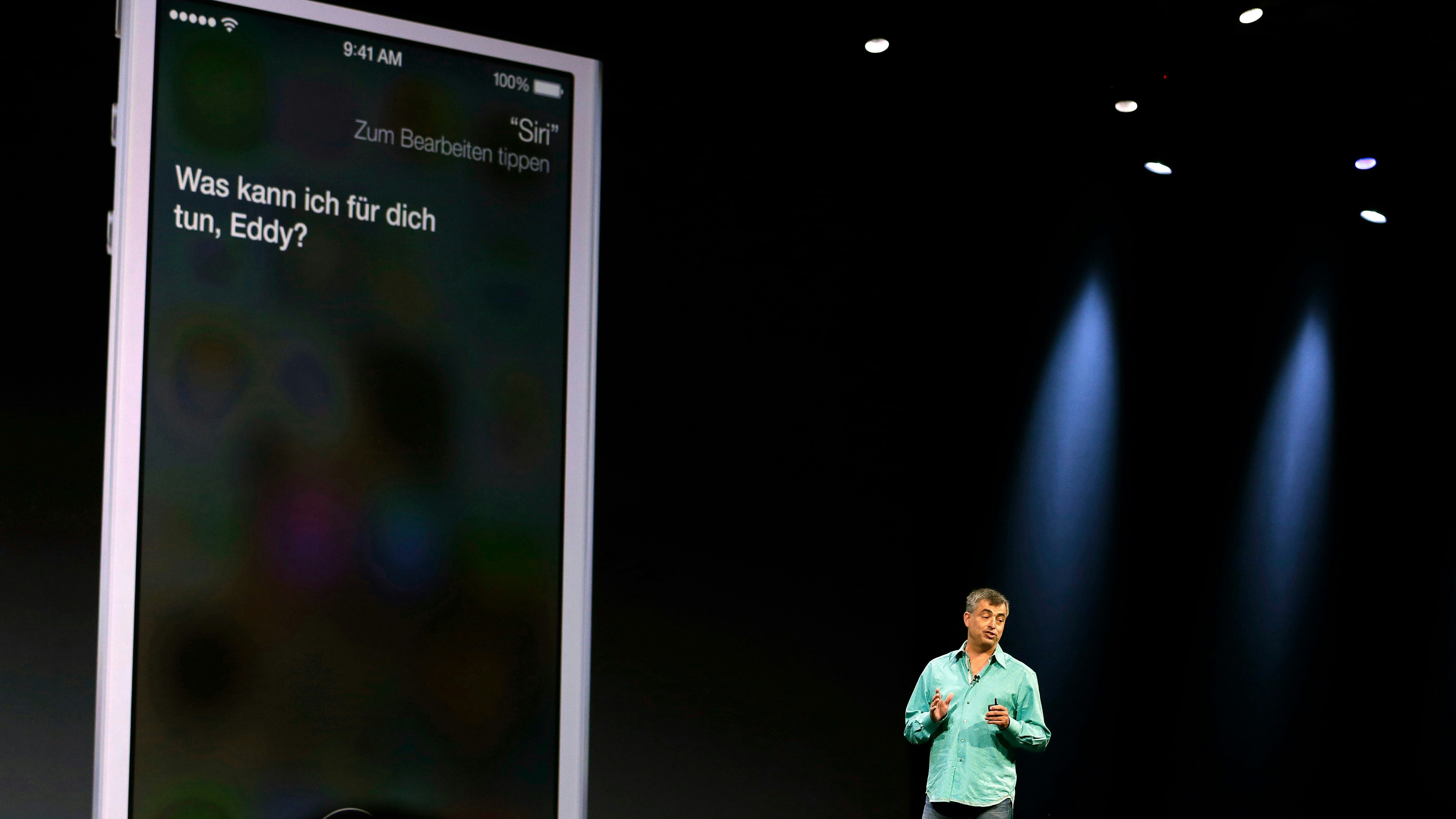 Eddy Cue showing off Siri in 2013. Photo by AP.