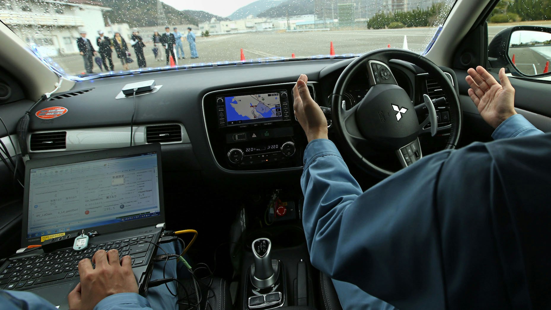 A self-driving Mitsubishi car. Photo by Bloomberg.