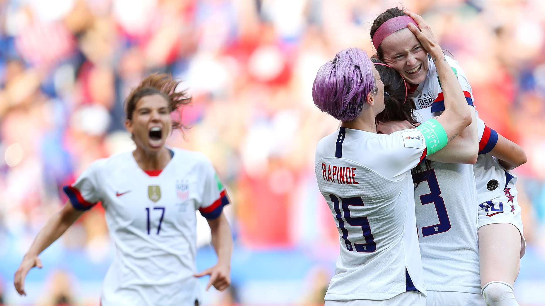 Soccer players and co-founders of Re-Inc, Tobin Heath (far left) and Megan Rapinoe (center left), celebrate a goal in 2019. Photo via Getty.