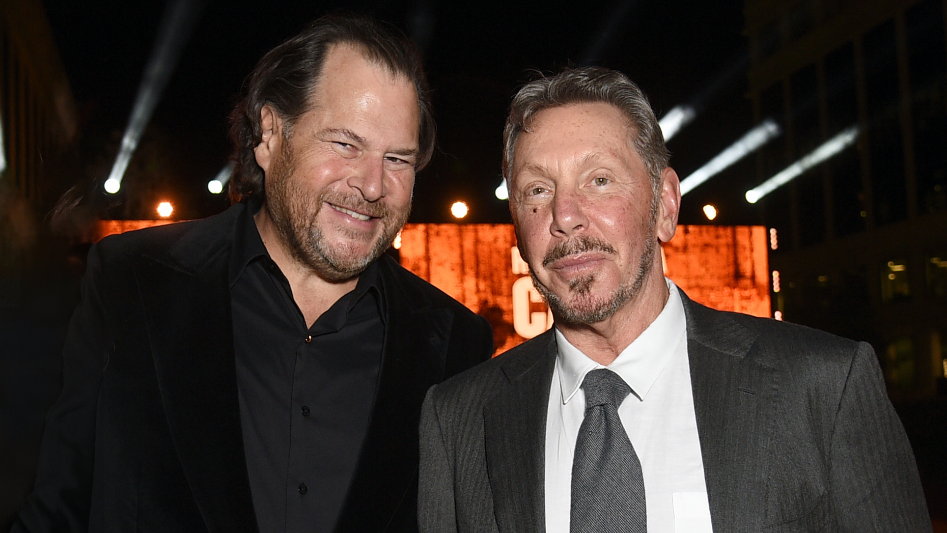 Marc Benioff and Larry Ellison. Photo via Getty.