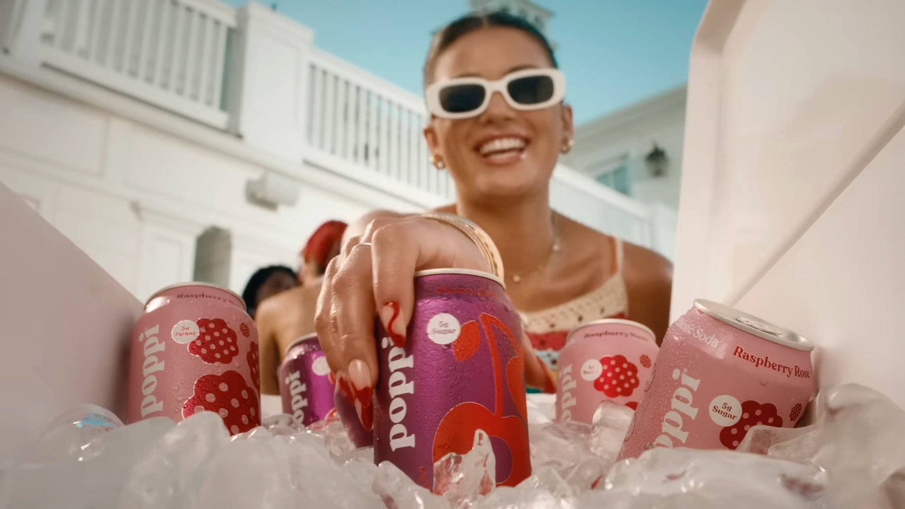 Still from Poppi's 2025 Super Bowl commercial. Screenshot via YouTube.