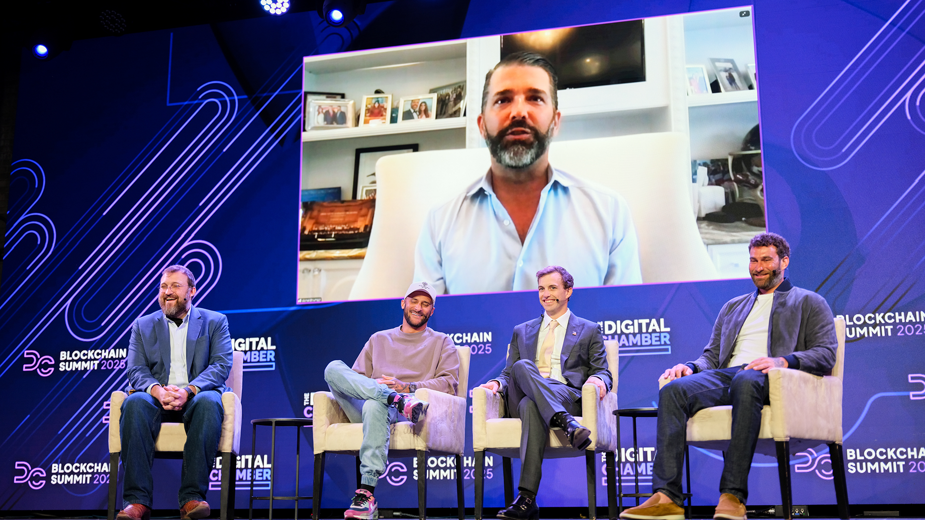 From second left: co-founders of World Liberty Financial Chase Herro, Zach Witkoff, Zach Folkman and Donald Trump Jr. (on screen). Photo by Getty