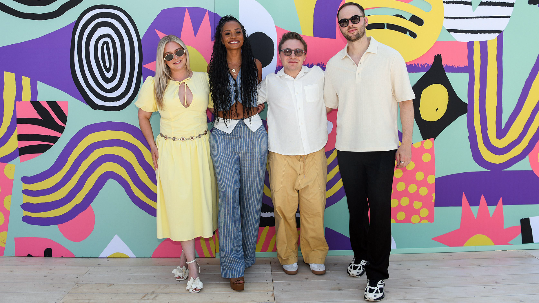 From left: Morgan Absher, Host of Two Hot Takes, “The Bachelorette” star Rachel Lindsay, Jake Shane, Host of Therapuss and Roman Wasenmüller, Head of Podcast Business at Spotify. Photo by Getty Images for Spotify.