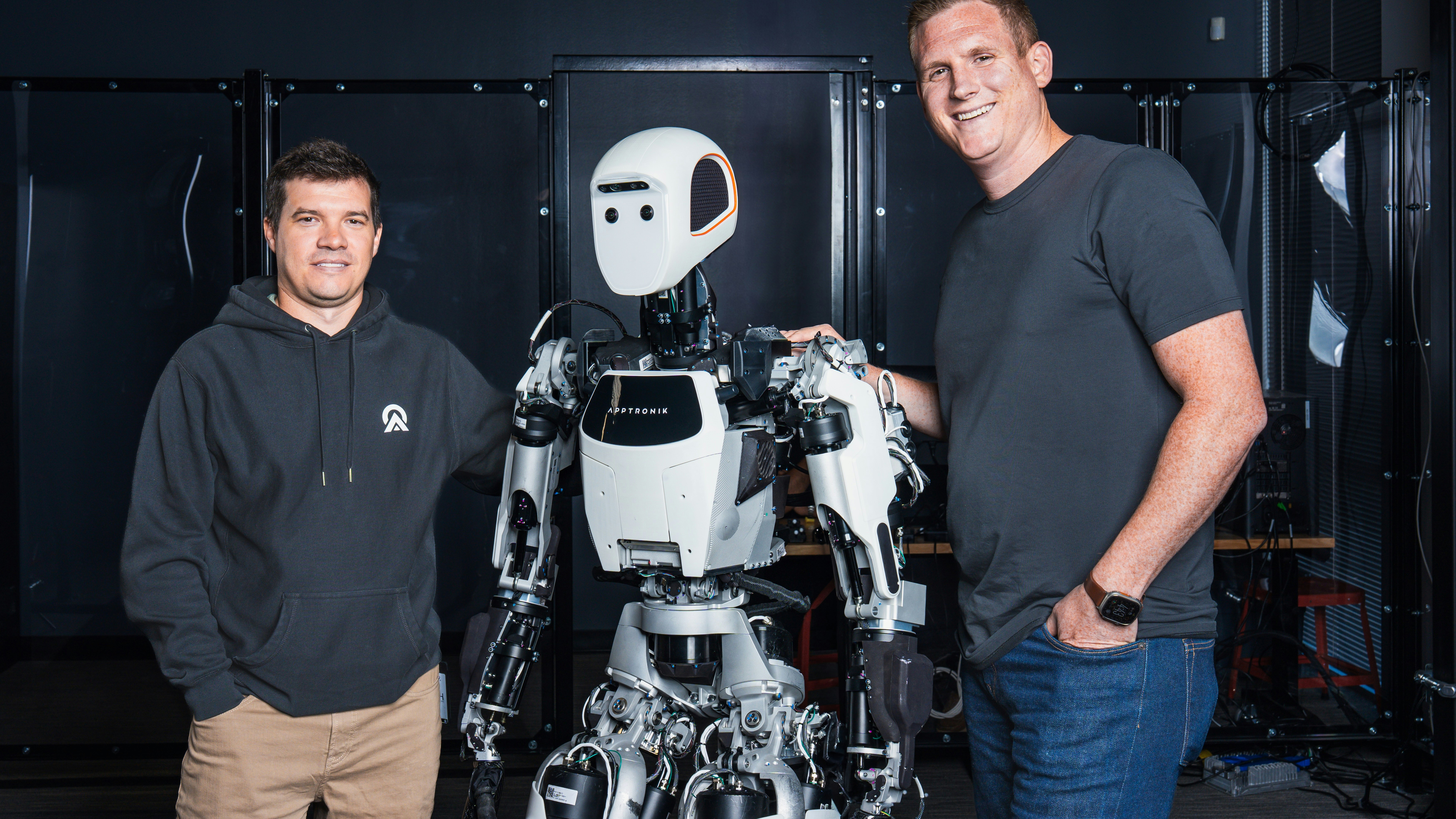 Apptronik co-founders Nick Paine, left, and Jeff Cardenas, along with Apollo, their humanoid robot. Photo: Courtesy Apptronik.  