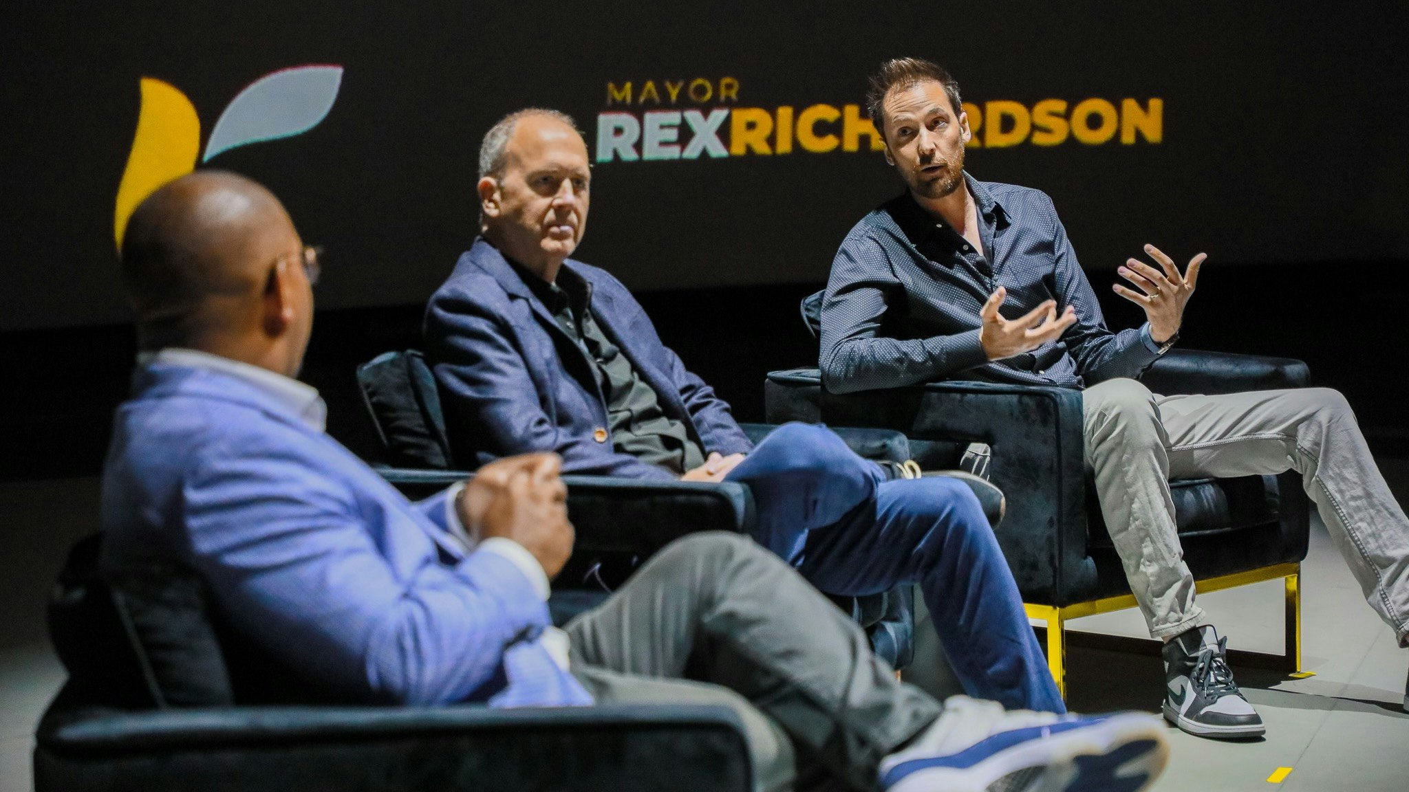 Alan Clarke, right, head of Ford's secret skunkworks, with Doug Field, Ford's chief EV officer, middle, and Long Beach Mayor Rex Richardson. Photo: Courtesy Long Beach Mayor's Office.    