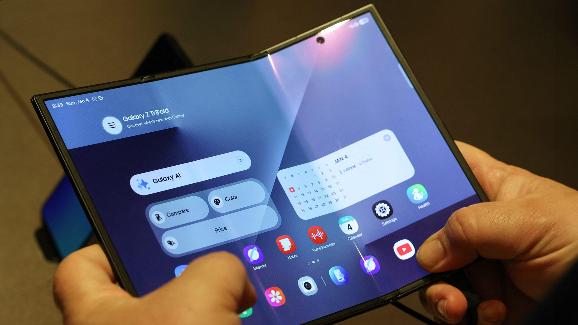 The Samsung Galaxy Z TriFold smartphone, with AI powered by Google’s Gemini, at CES. Patrick T. Fallon/AFP via Getty Images.