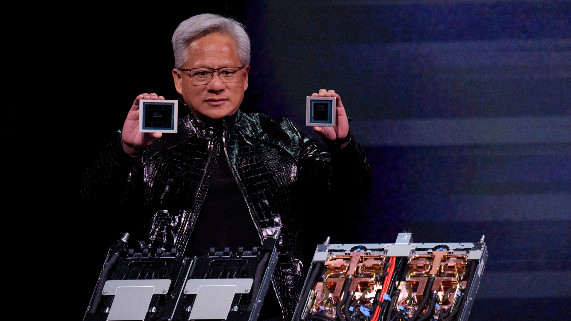 Nvidia CEO Jensen Huang presents at CES. Bridget Bennett/Bloomberg via Getty Images.