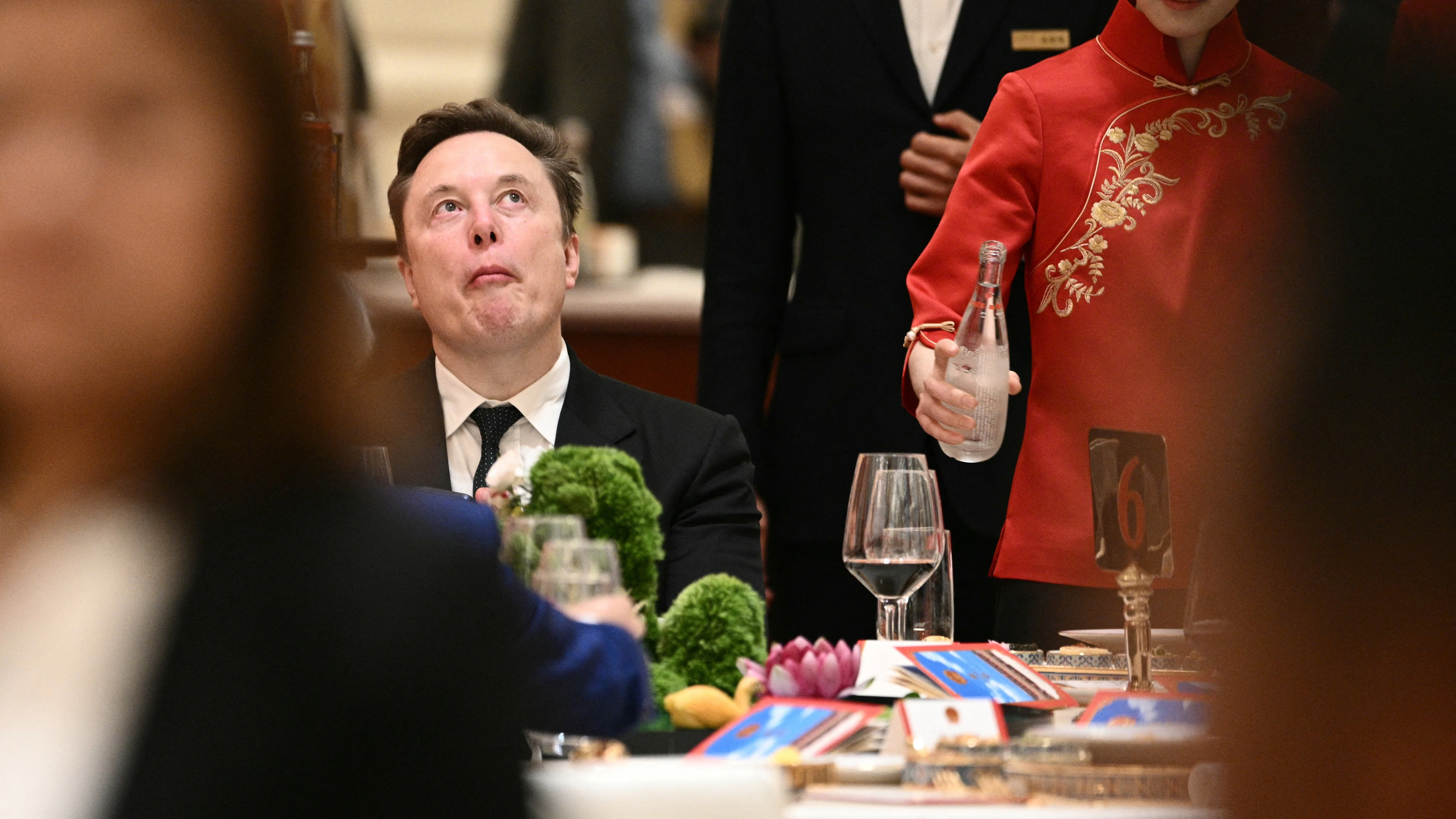 Musk at a banquet in the Great Hall of the People in Beijing on Thursday. Photo: Brendan Smialowski/AFP/Getty 
