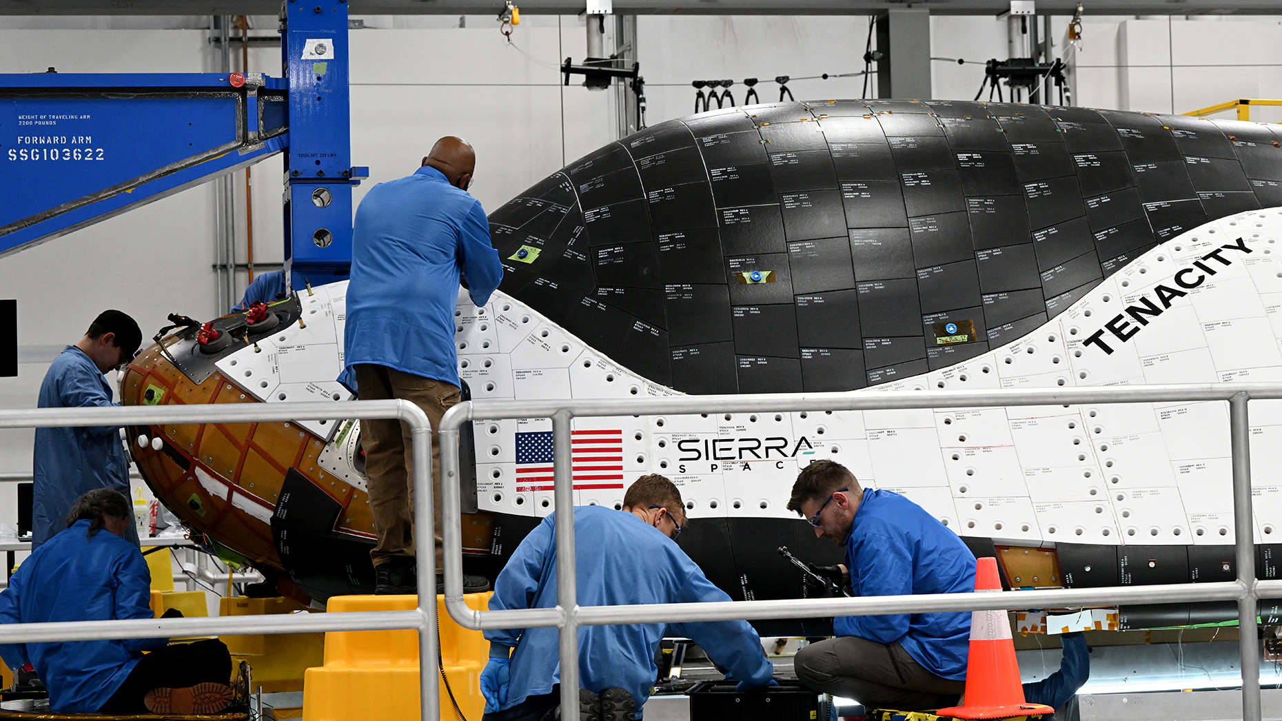 Technicians work on the the Dream Chaser at Sierra Space in 2023. Photo by Helen H. Richardson/ Getty Images