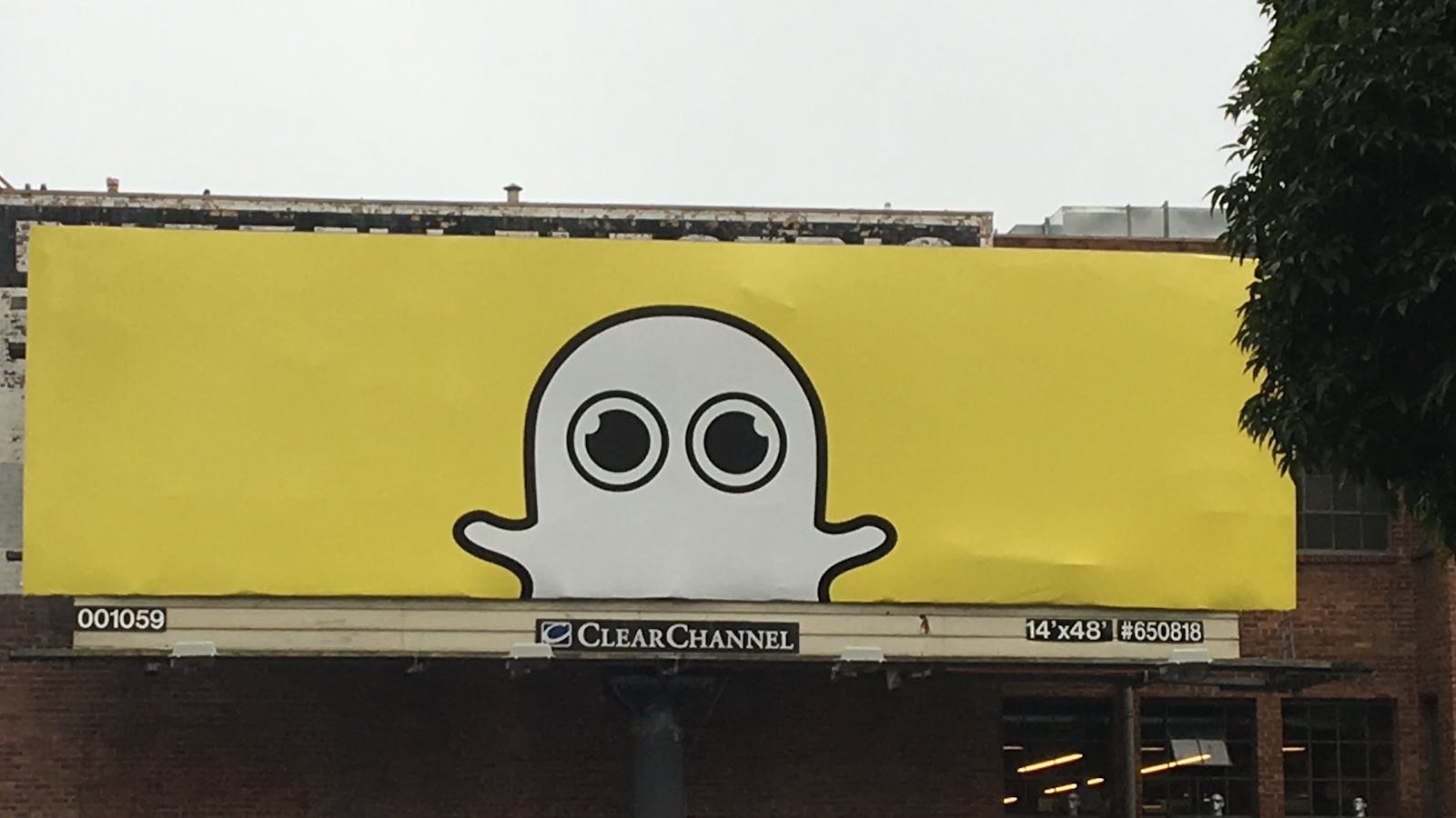A billboard in San Francisco displaying an updated version of Snapchat's Ghost logo to include the Spectacles. Photo by Tom Dotan.
