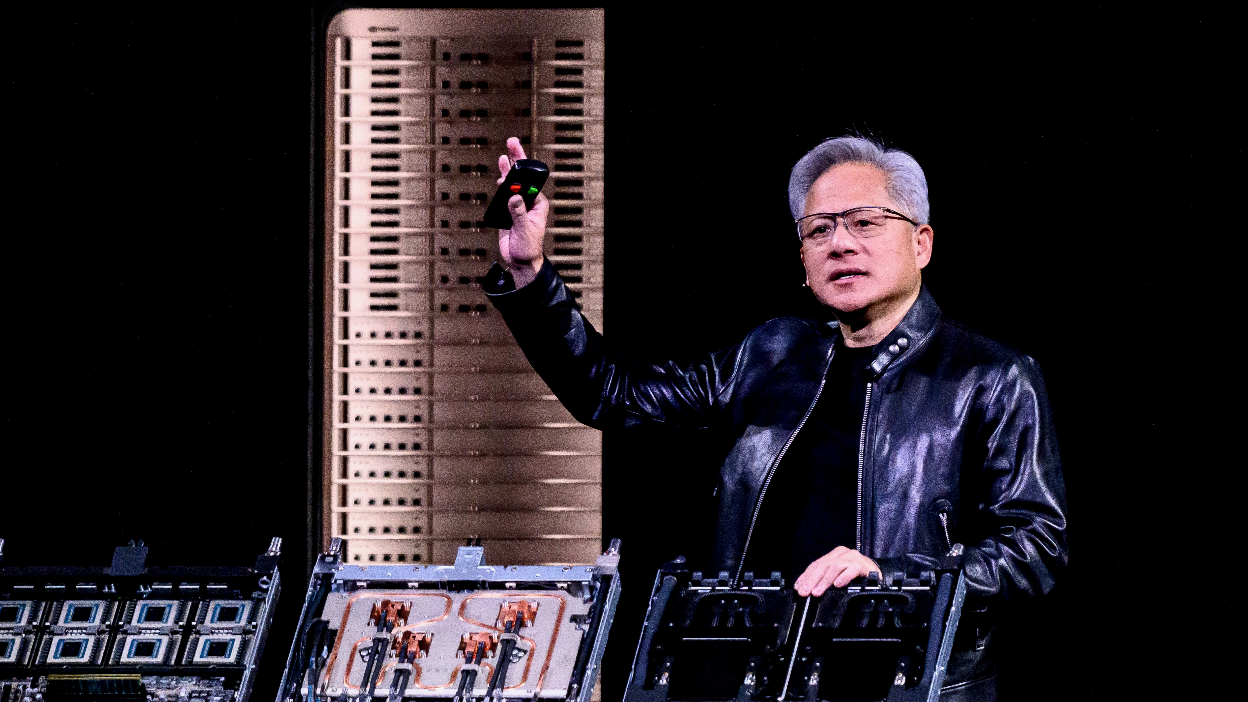Nvidia CEO Jensen Huang shows off the Vera Rubin chip system. Getty Images