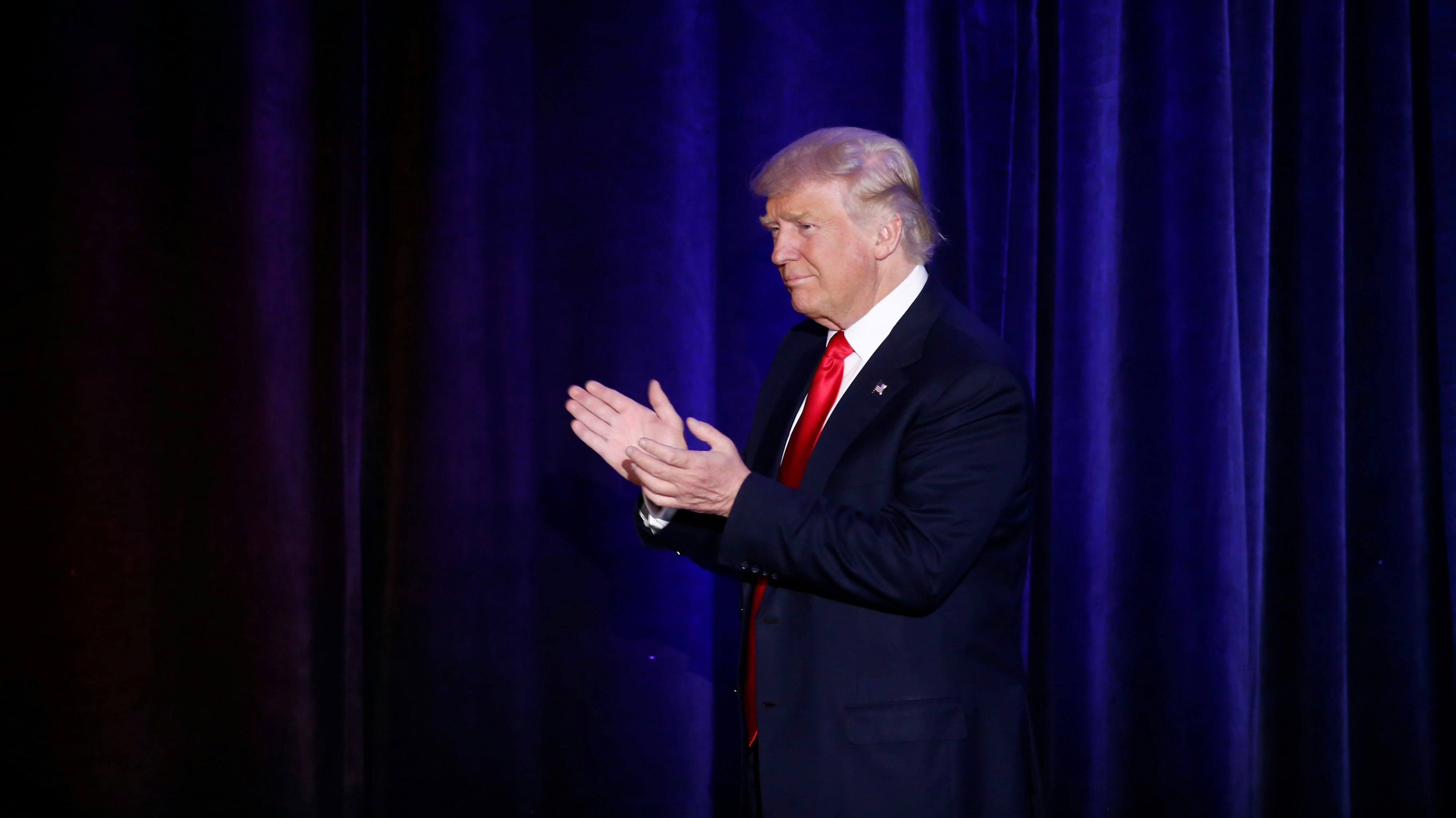 President-elect Trump arriving on stage during an election night party in New York on Tuesday night. Photo by Bloomberg.