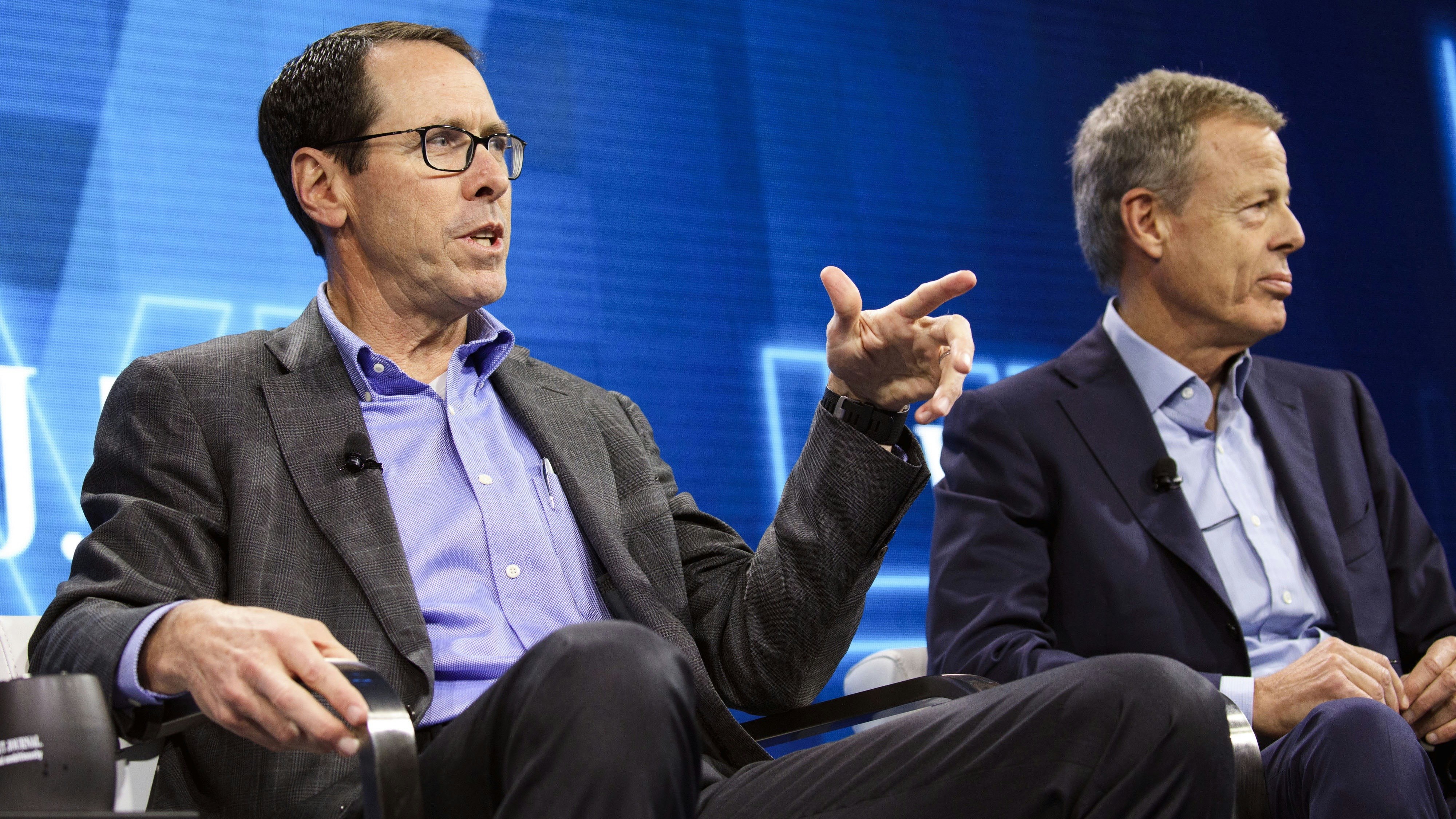 AT&T Randall Stephenson and Time Warner CEO Jeff Bewkes. Photo by Bloomberg.