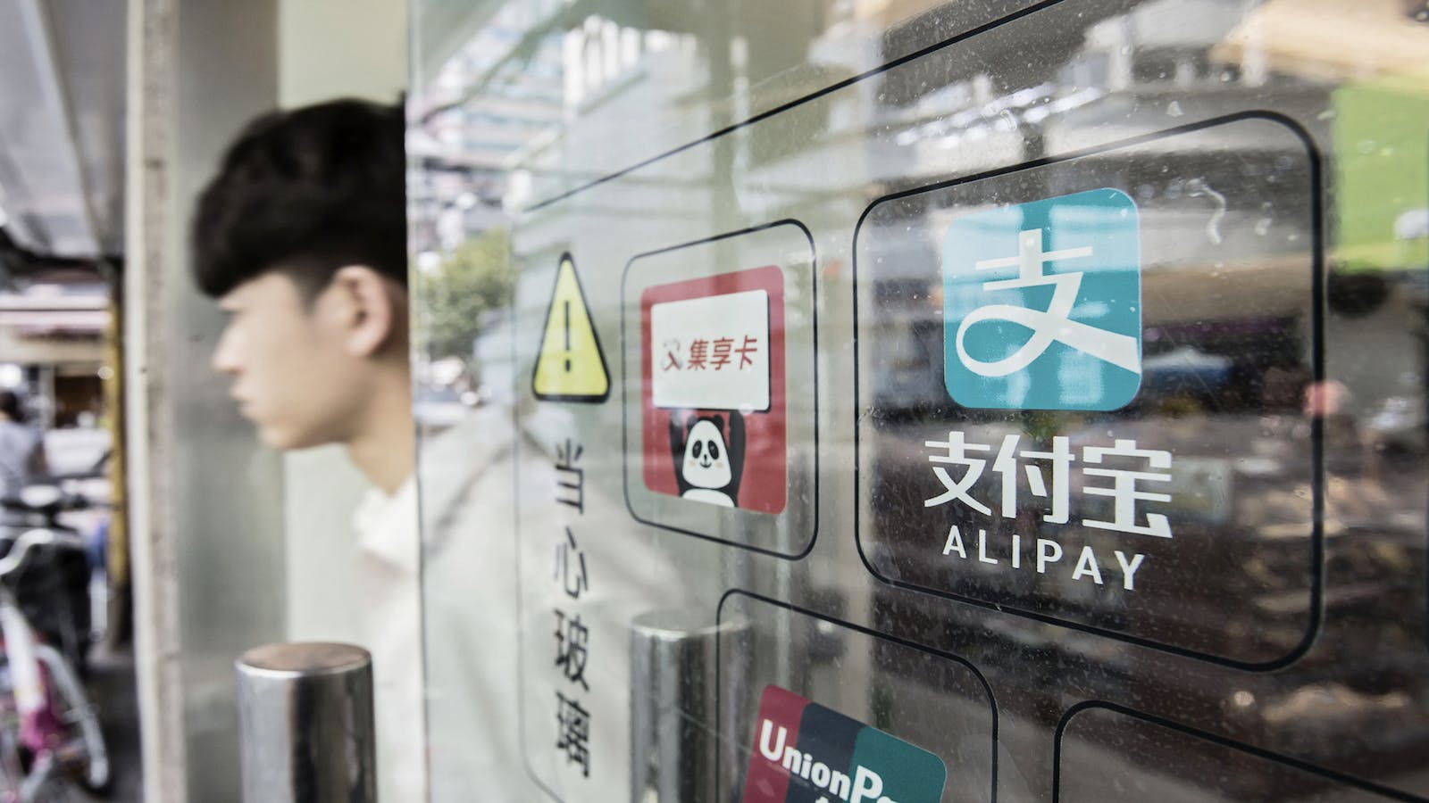 Alipay and Tenpay together hold  91% of the online payments market in China. Photo: Bloomberg
