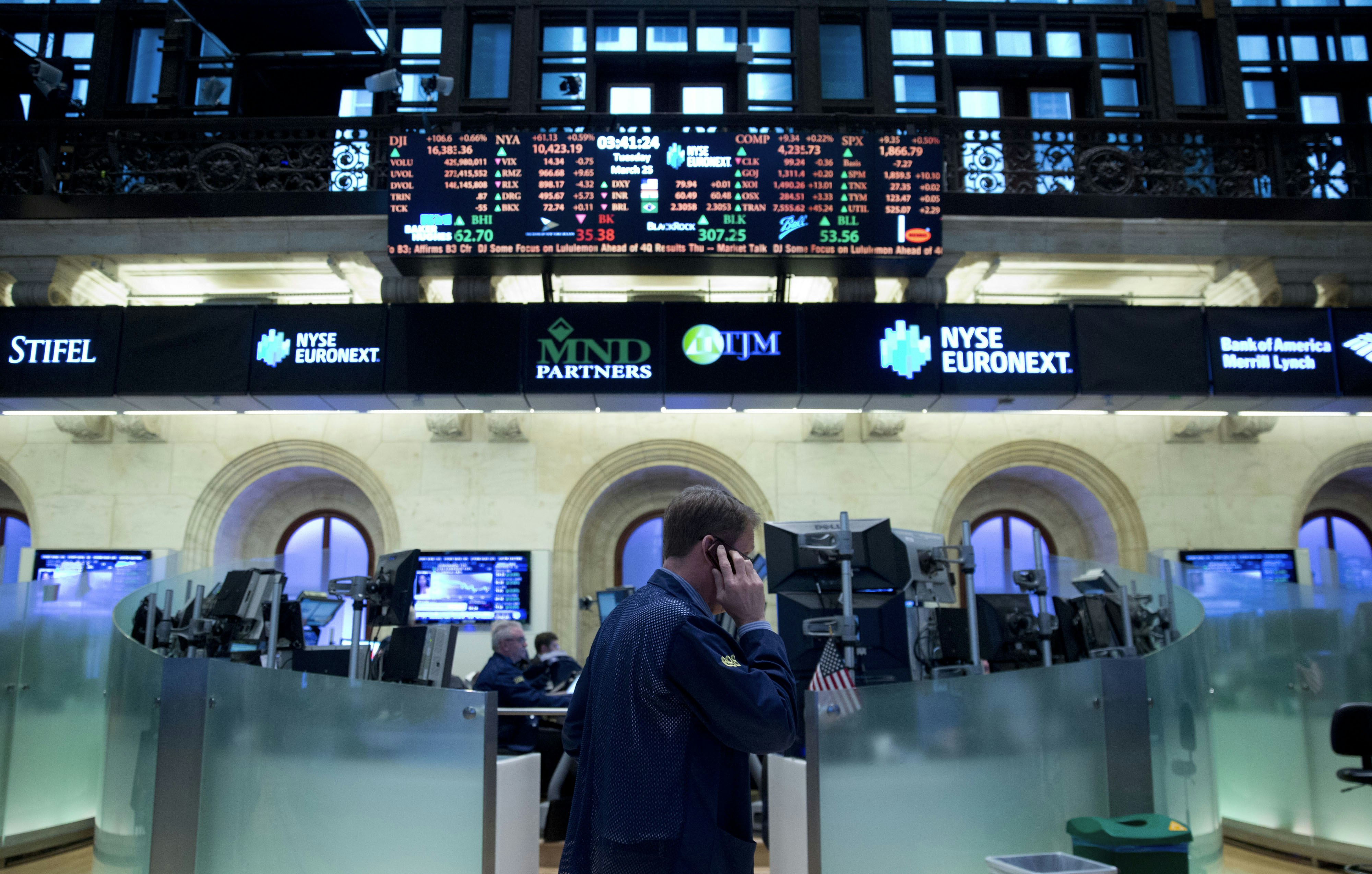 A trader at the New York Stock Exchange. Photo by Bloomberg.