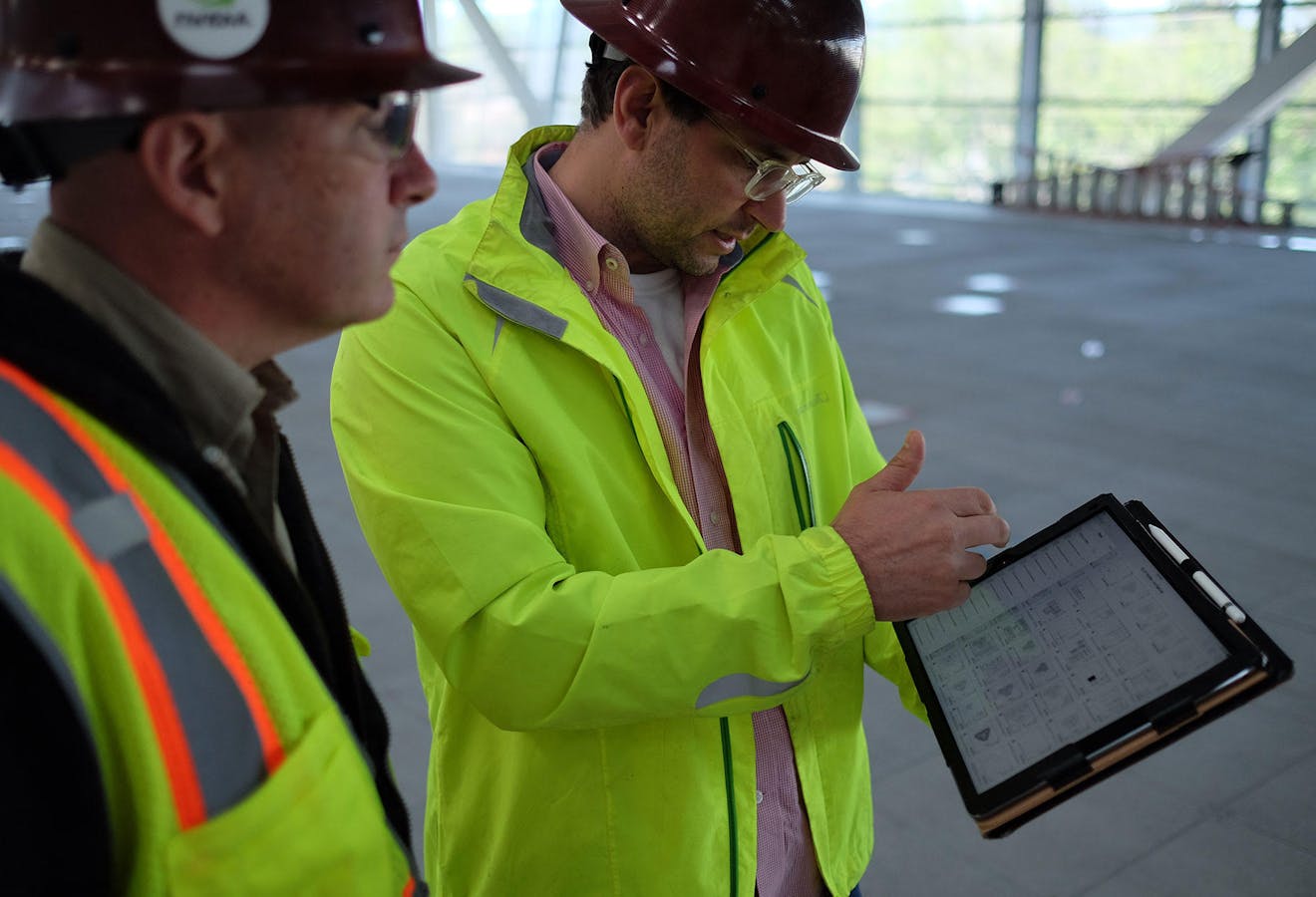 A Nvidia employee uses PlanGrid on the construction site for the chipmaker's new headquarters in Santa Clara, Calif.