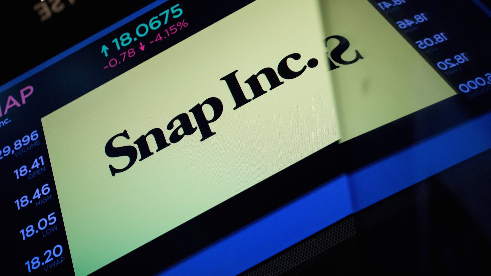A Snap sign at the New York Stock Exchange. Photo by Bloomberg.