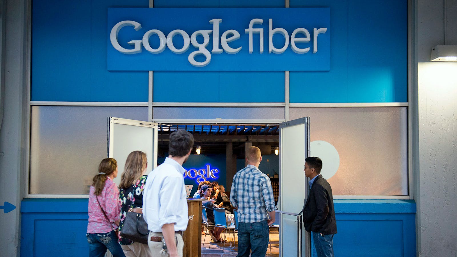People walk past Google Fiber's store in Austin, Texas in April, 2015. Photo by Bloomberg.