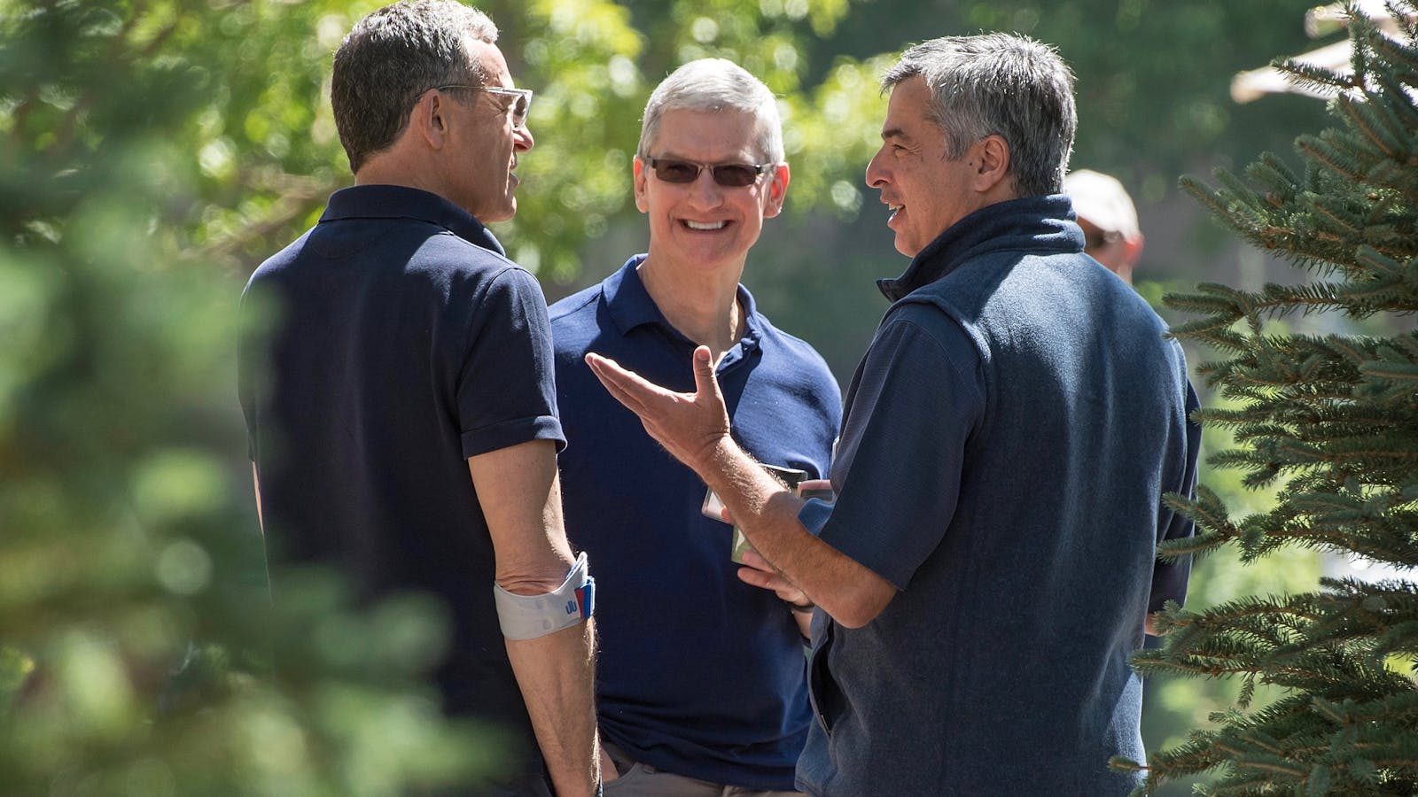 Disney CEO Robert Iger with Apple CEO Tim Cook and Apple executive Eddy Cue at Sun Valley in 2016. Photo by Bloomberg.
