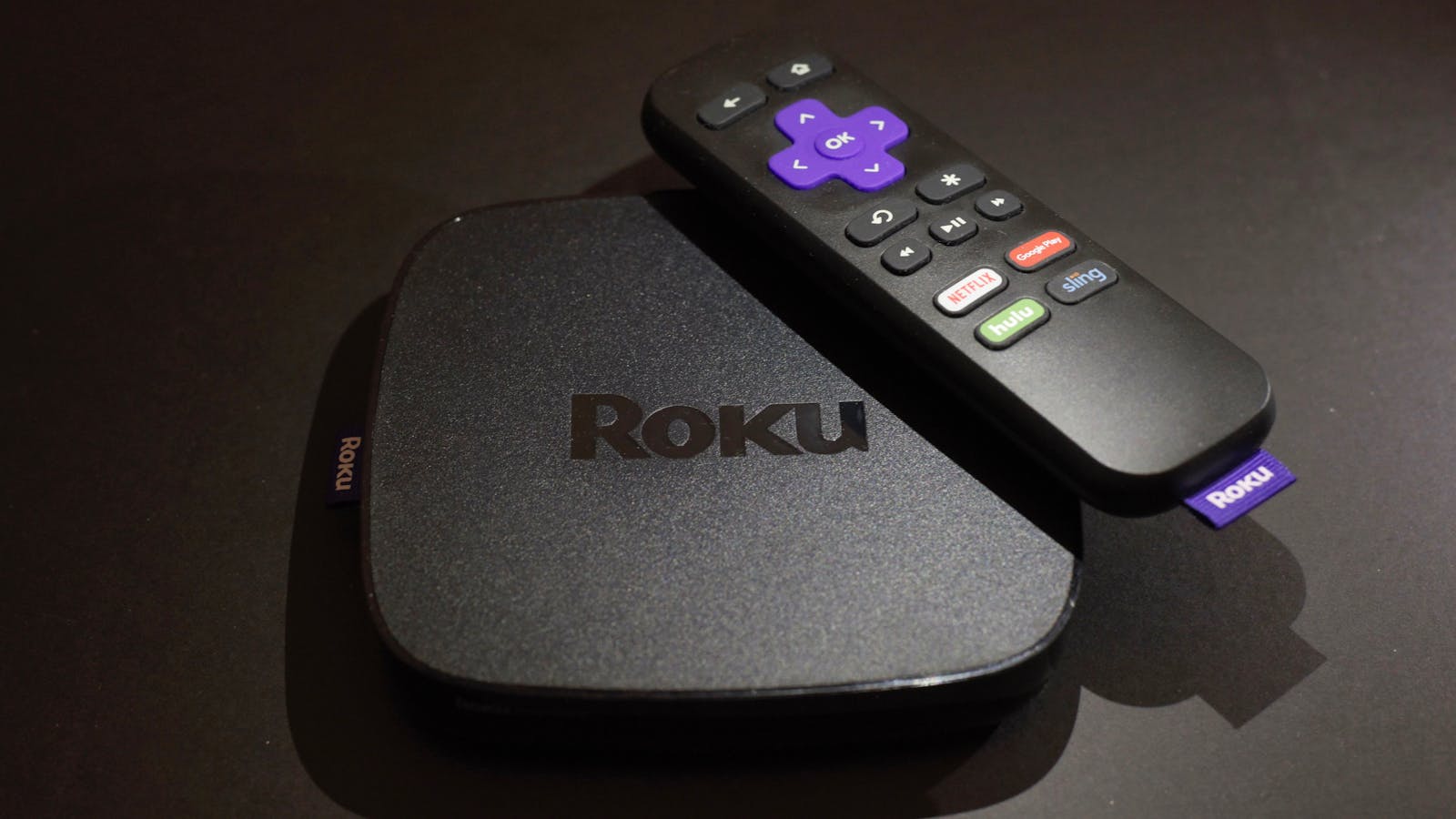 A Roku streaming device and remote control. Photo by AP