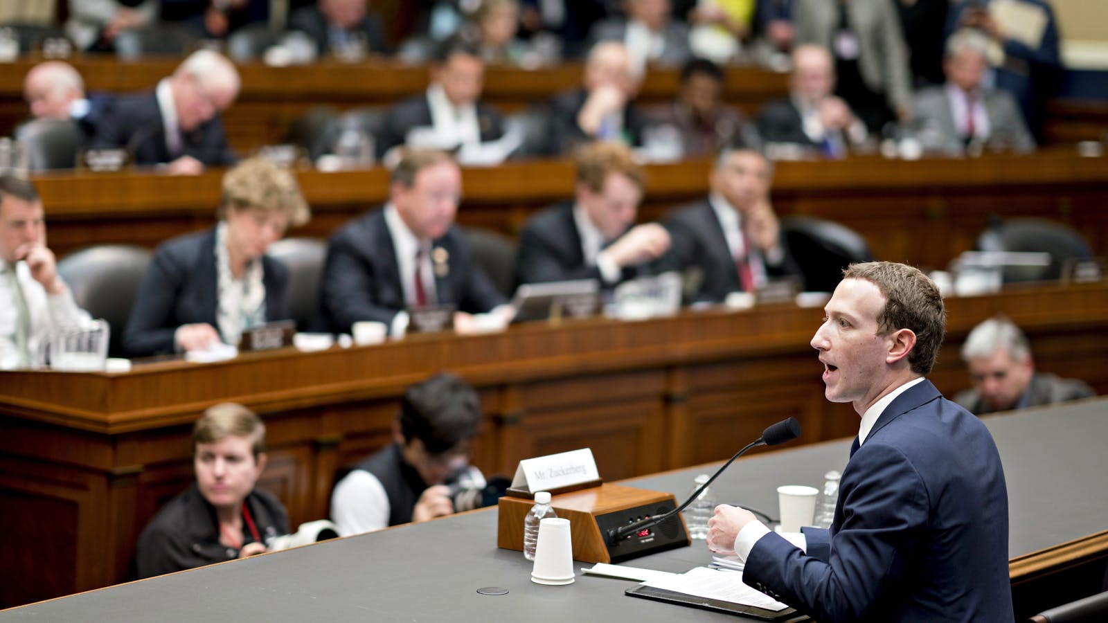 Facebook CEO Mark Zuckerberg speaks to a House committee on Wednesday. Photo by Bloomberg.