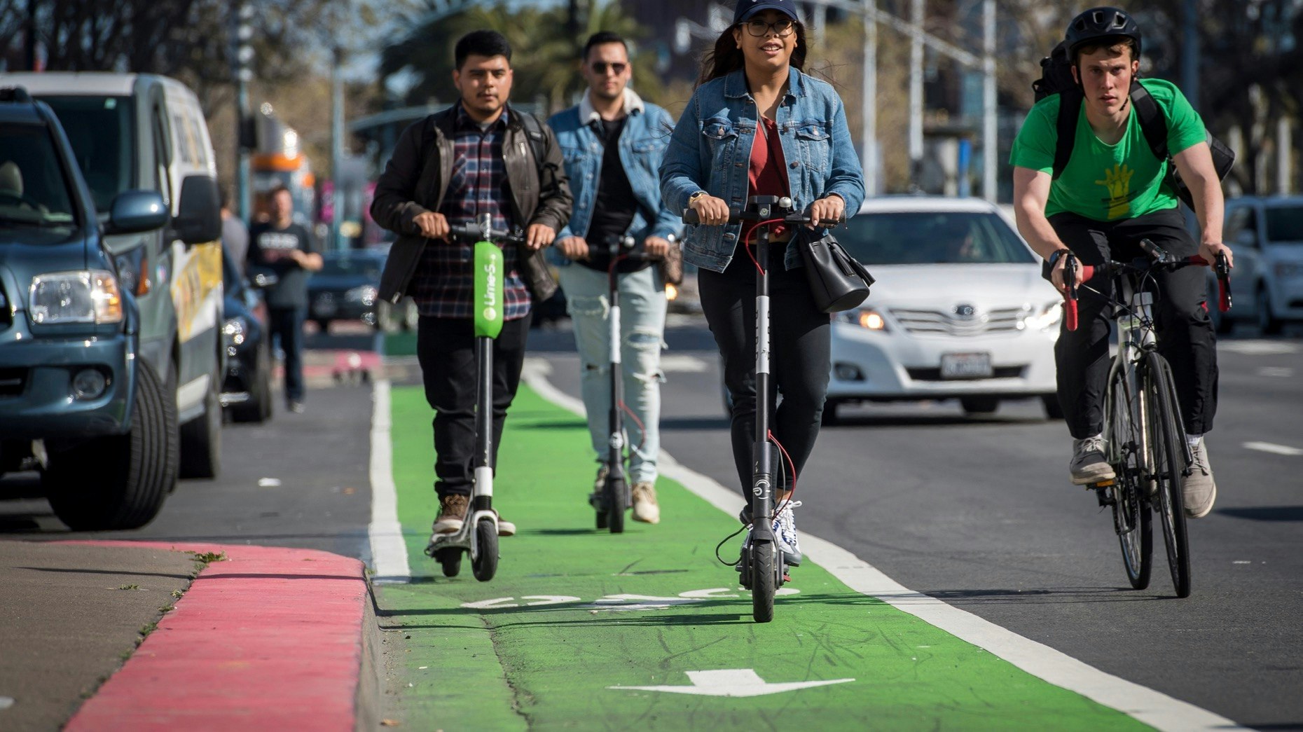 Riders use scooters in San Francisco in April. Photo: Bloomberg