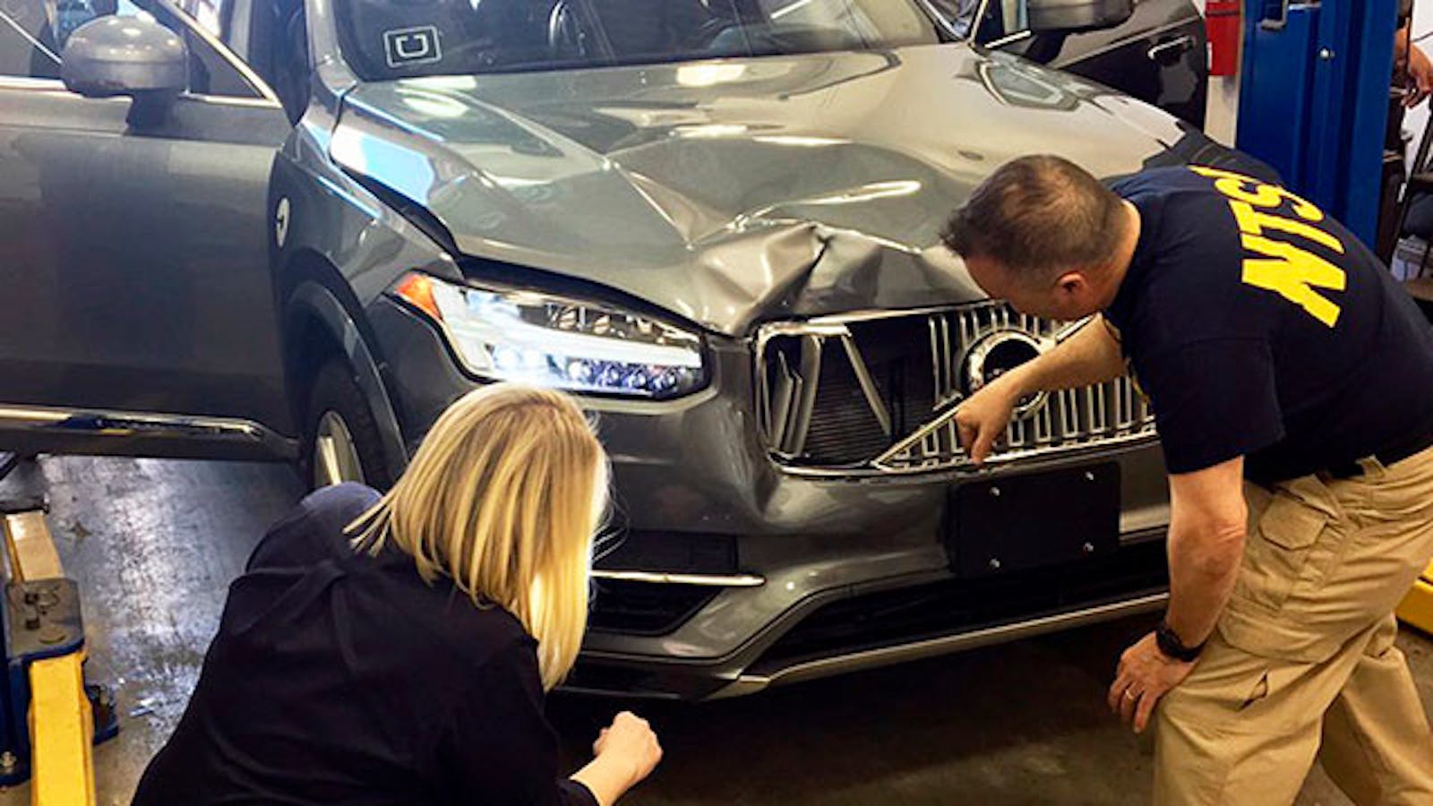 Investigators examined a self-driving Uber vehicle that fatally struck a woman in Tempe, Ariz., in March. Photo: AP