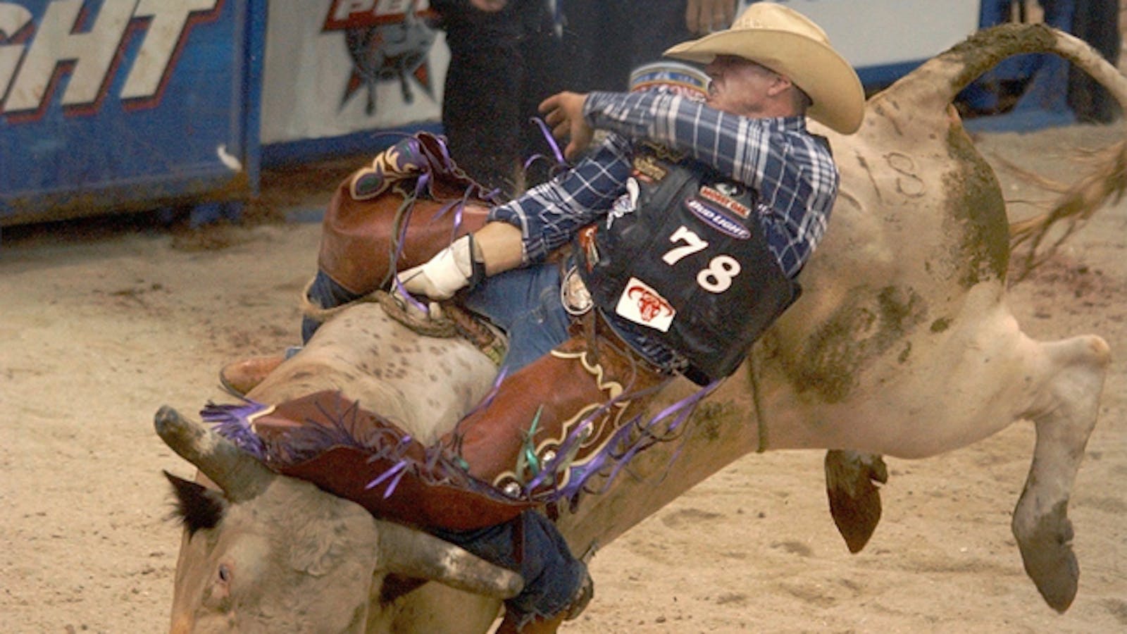 A bullrider during a Professional Bull Riders event. Endeavor now owns the Professional Bull Riders. Photo by AP.