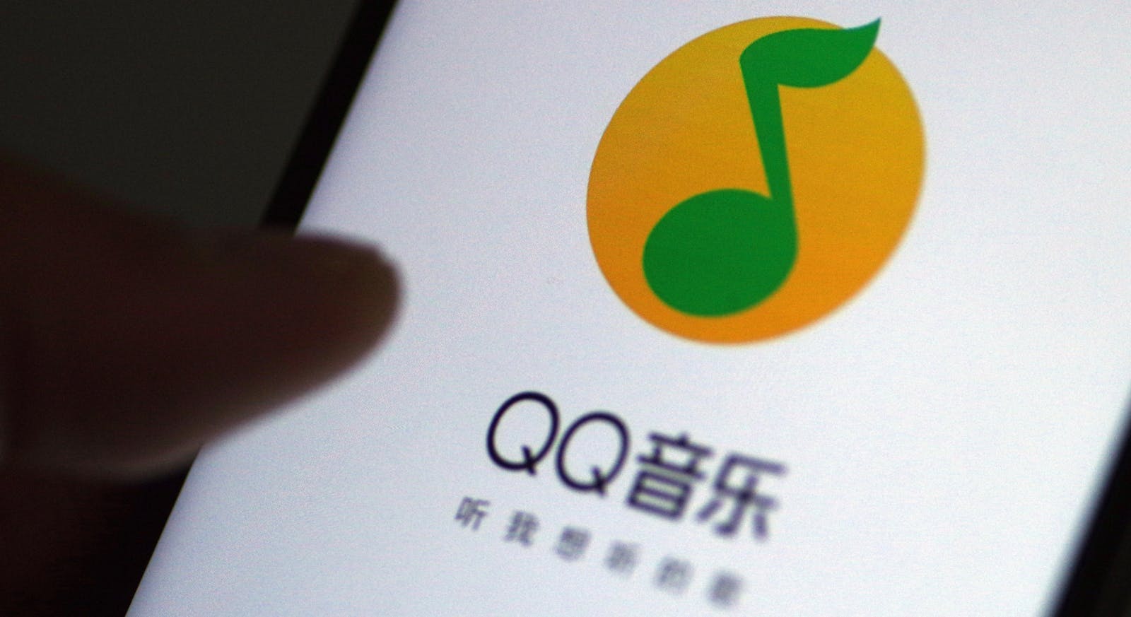 Tencent Music's QQ music streaming app on a phone in China last March. Photo by AP