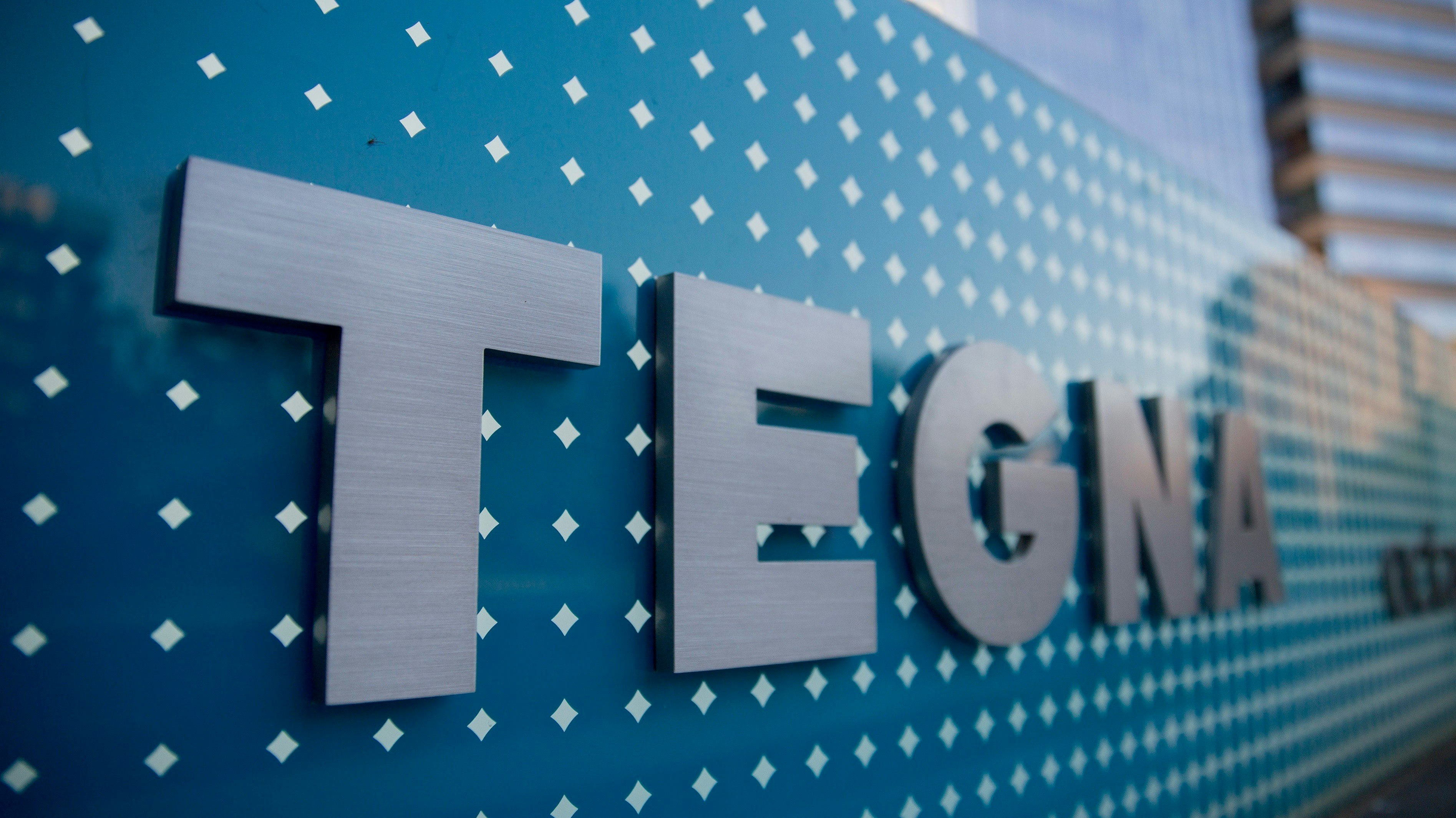 A Tegna sign at the company headquarters. Photo by Bloomberg